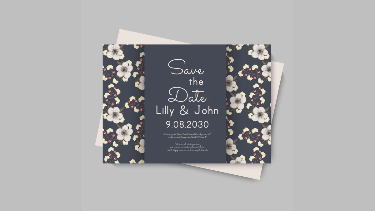 Navy floral save the date card with script lettering and the couple's names and date