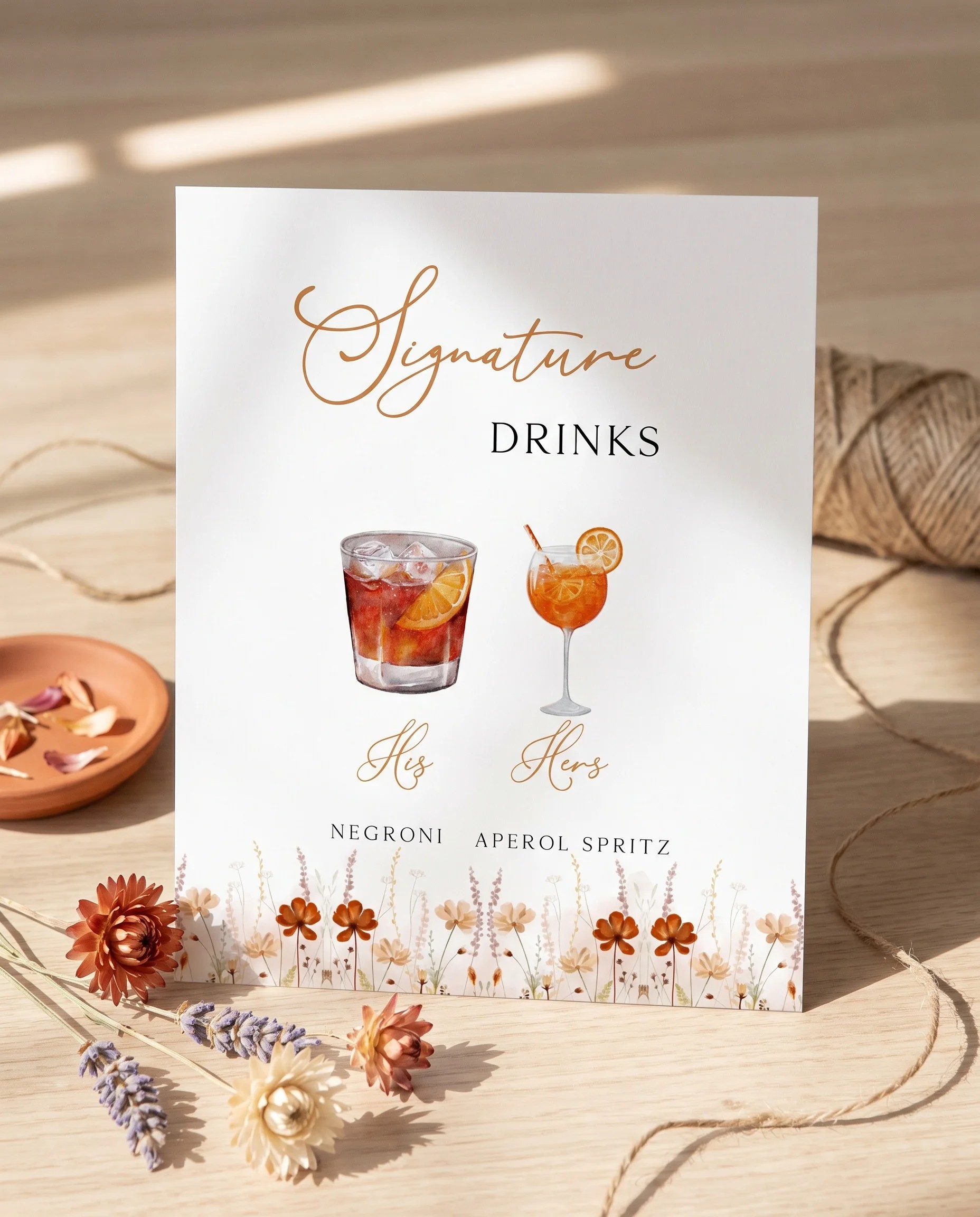 Amber Meadow — bar menu displayed upright in a styled setting, shot from a slight overhead angle in soft natural light, wedding bar sign.