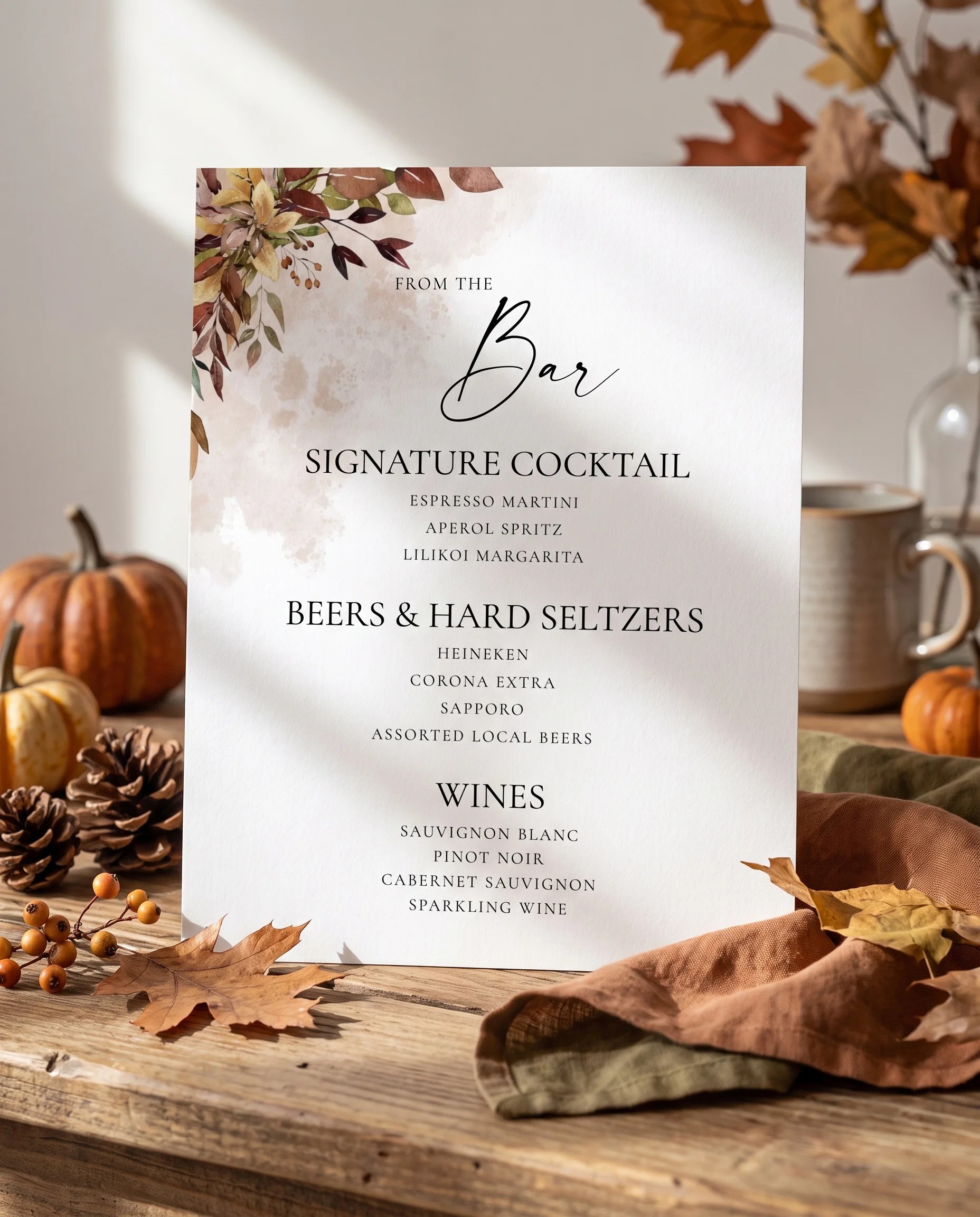 Autumn Bough — bar menu page displayed upright in a styled setting under soft natural light, wedding bar sign.