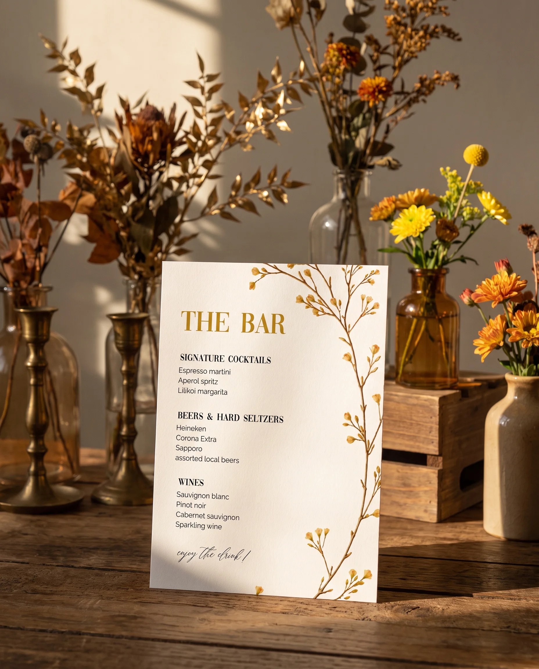 Golden Vine — bar menu page displayed upright in a styled setting under soft natural light, wedding bar sign.