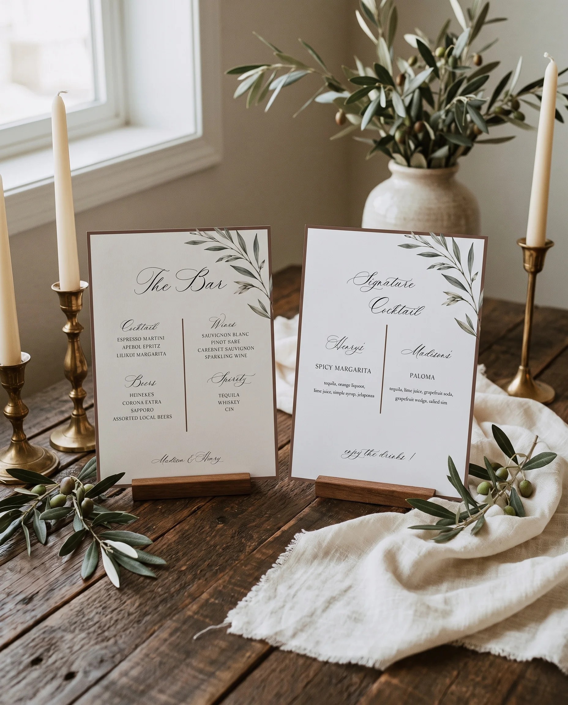 Olive Arc — bar menu shown upright in a styled setting under soft natural light at a slight overhead angle, wedding bar sign.
