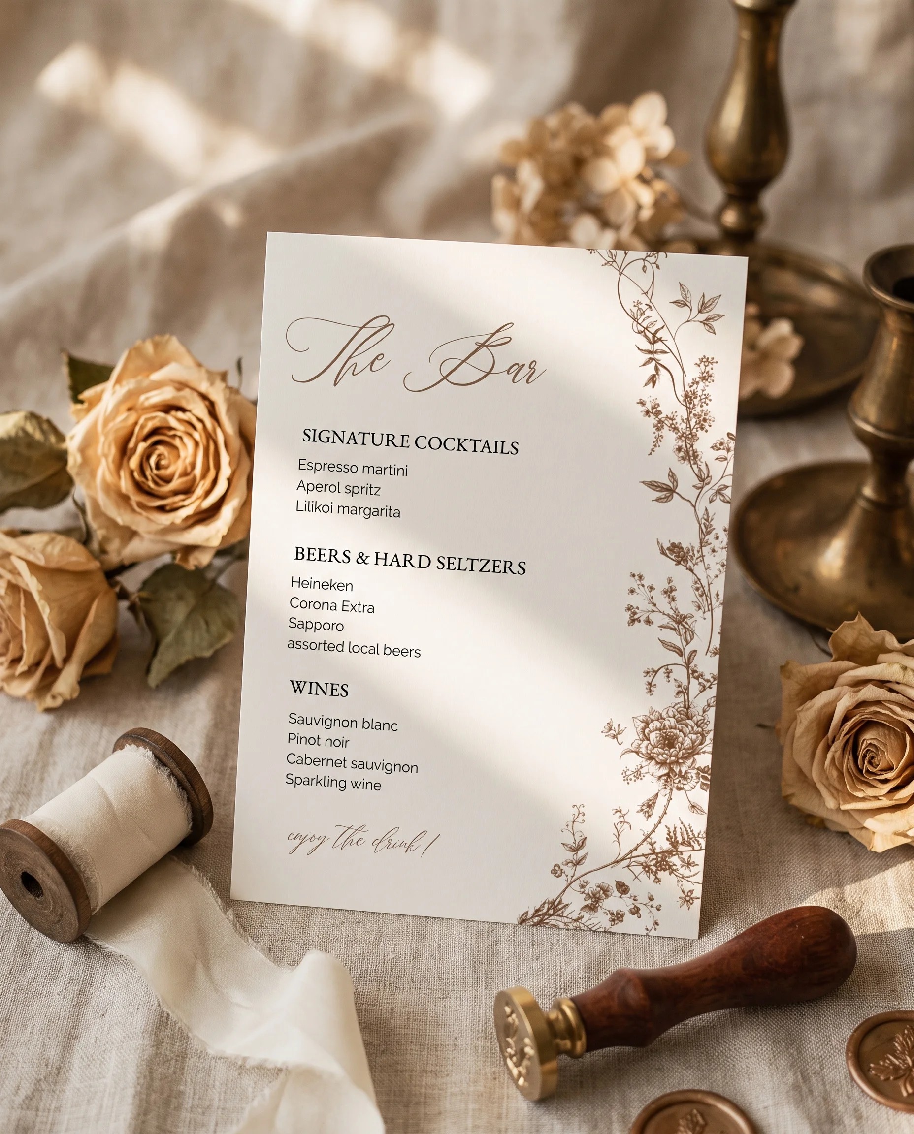 Sepia Crest — bar menu page displayed upright in a styled setting under soft natural light, wedding bar sign.