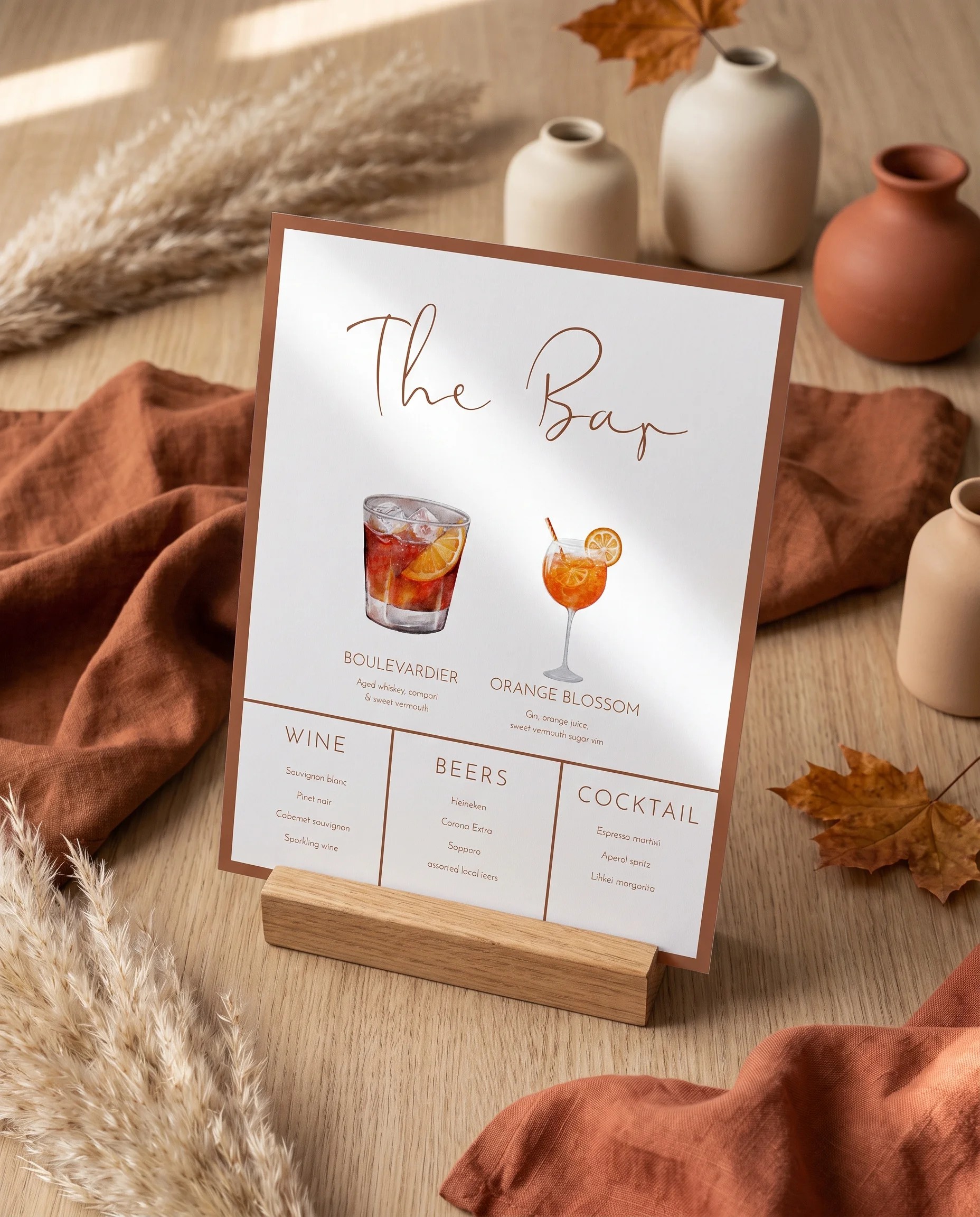 Stevens — bar menu page displayed upright under soft natural light with a slight overhead angle, wedding bar sign.