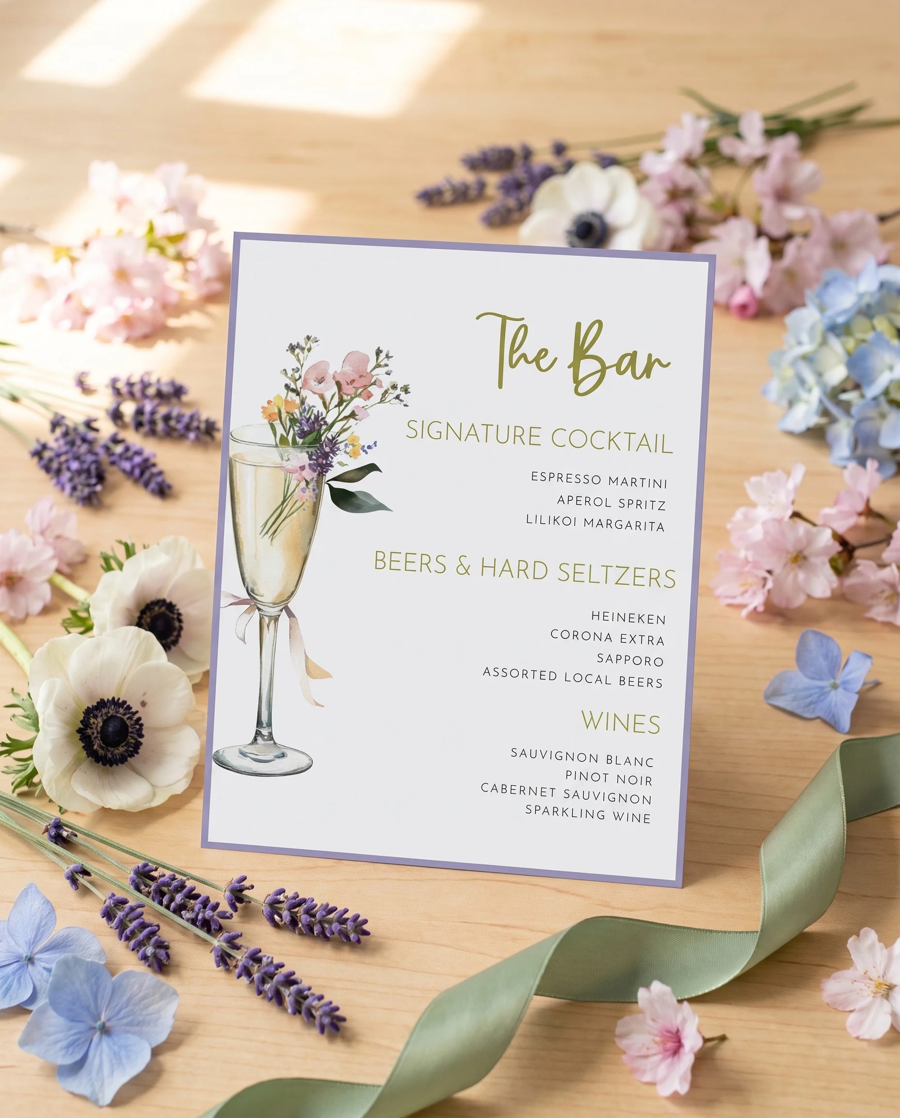 Anemone Toast — bar menu page displayed upright in a styled setting under soft natural light, wedding bar sign.