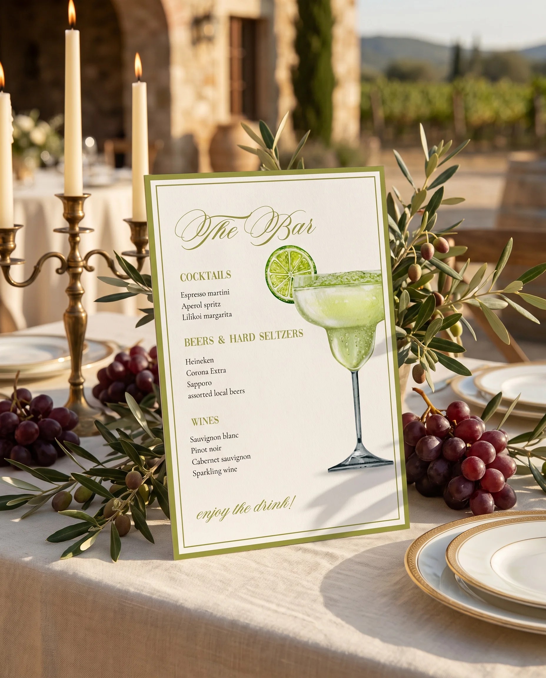 Olive Baroque — bar menu displayed upright on premium editorial paper under soft natural light, slight overhead angle, wedding bar sign.