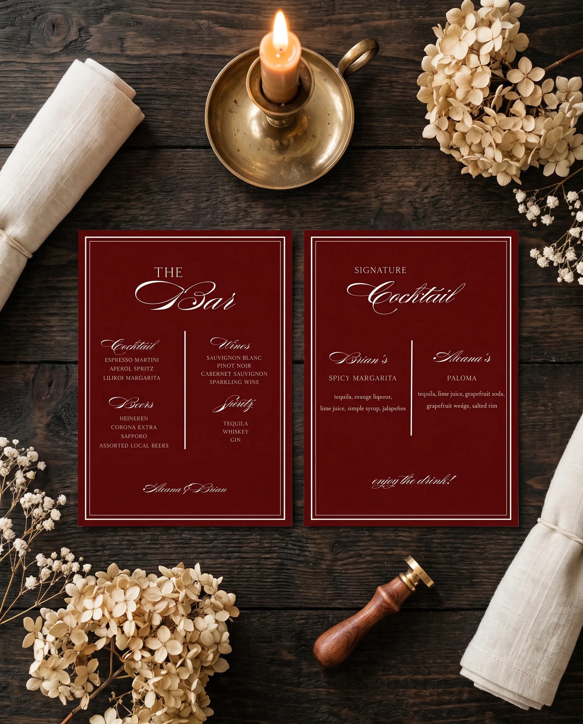 Claret Filigree — flat lay of both bar menu pages under soft overhead light on premium editorial paper, wedding bar menu.