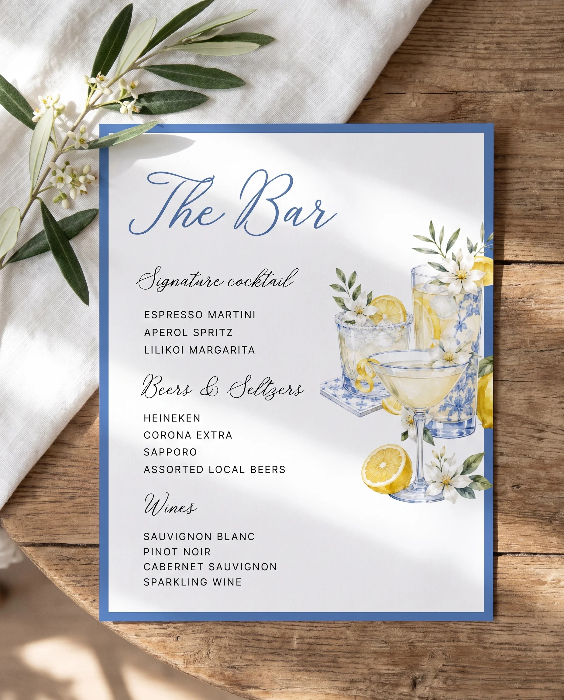 Amalfi Grove — bar menu page shown flat on premium editorial paper under soft natural light, slight overhead angle, wedding bar menu.