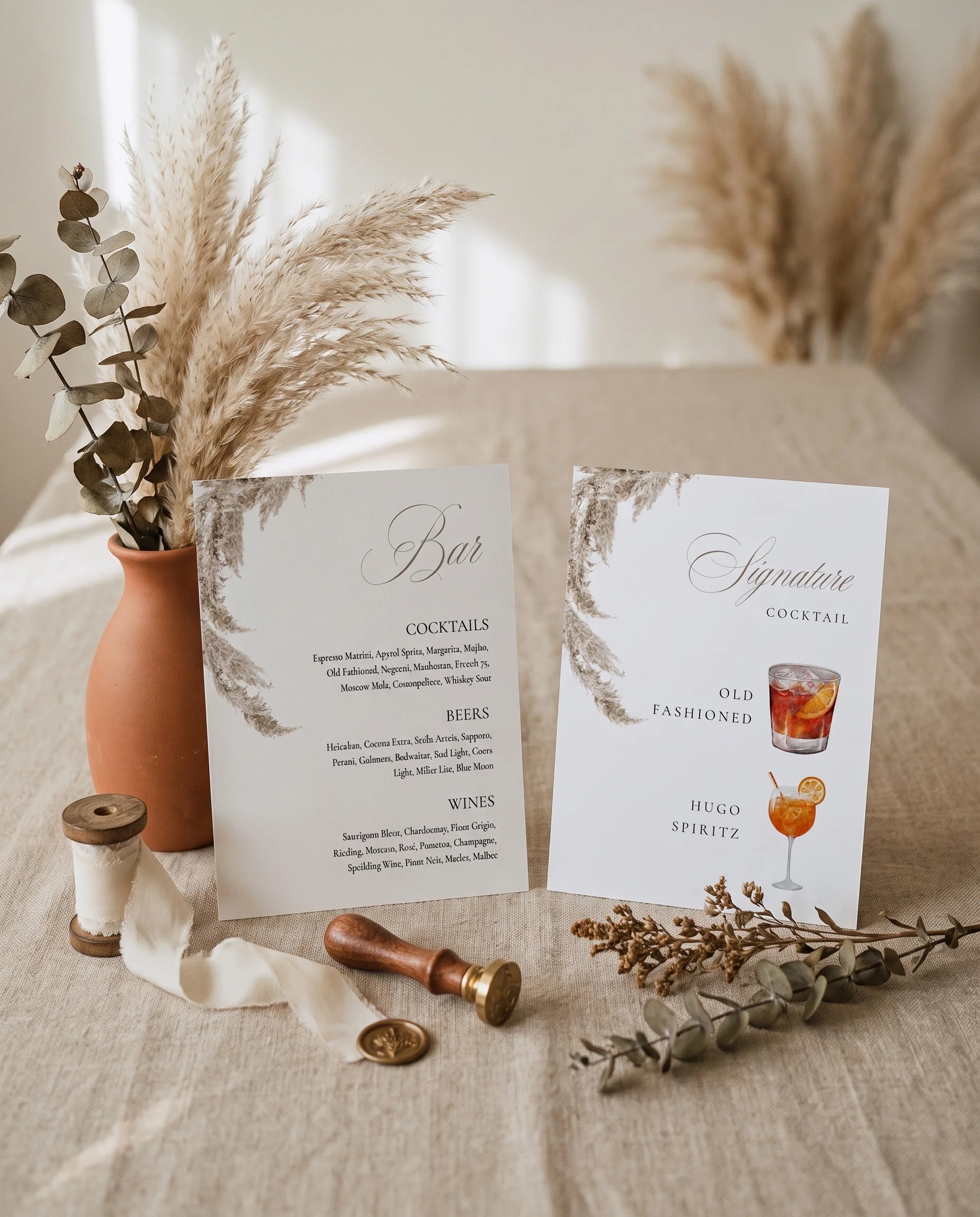Pampas — bar menu displayed upright in a styled setting under soft natural light, wedding bar sign.