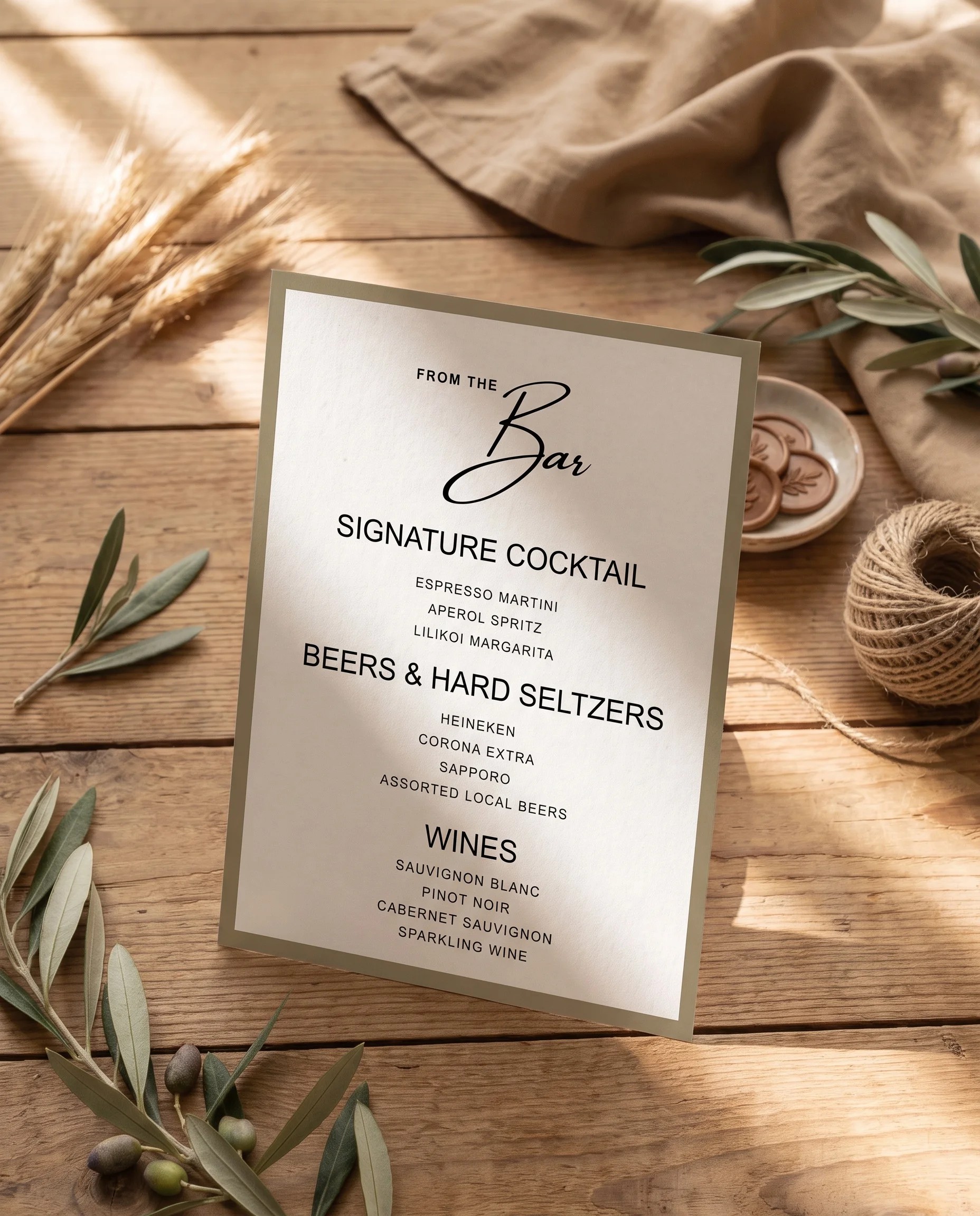 Golden Vale — bar menu displayed upright in a styled setting under soft natural light at a slight overhead angle, wedding bar sign.