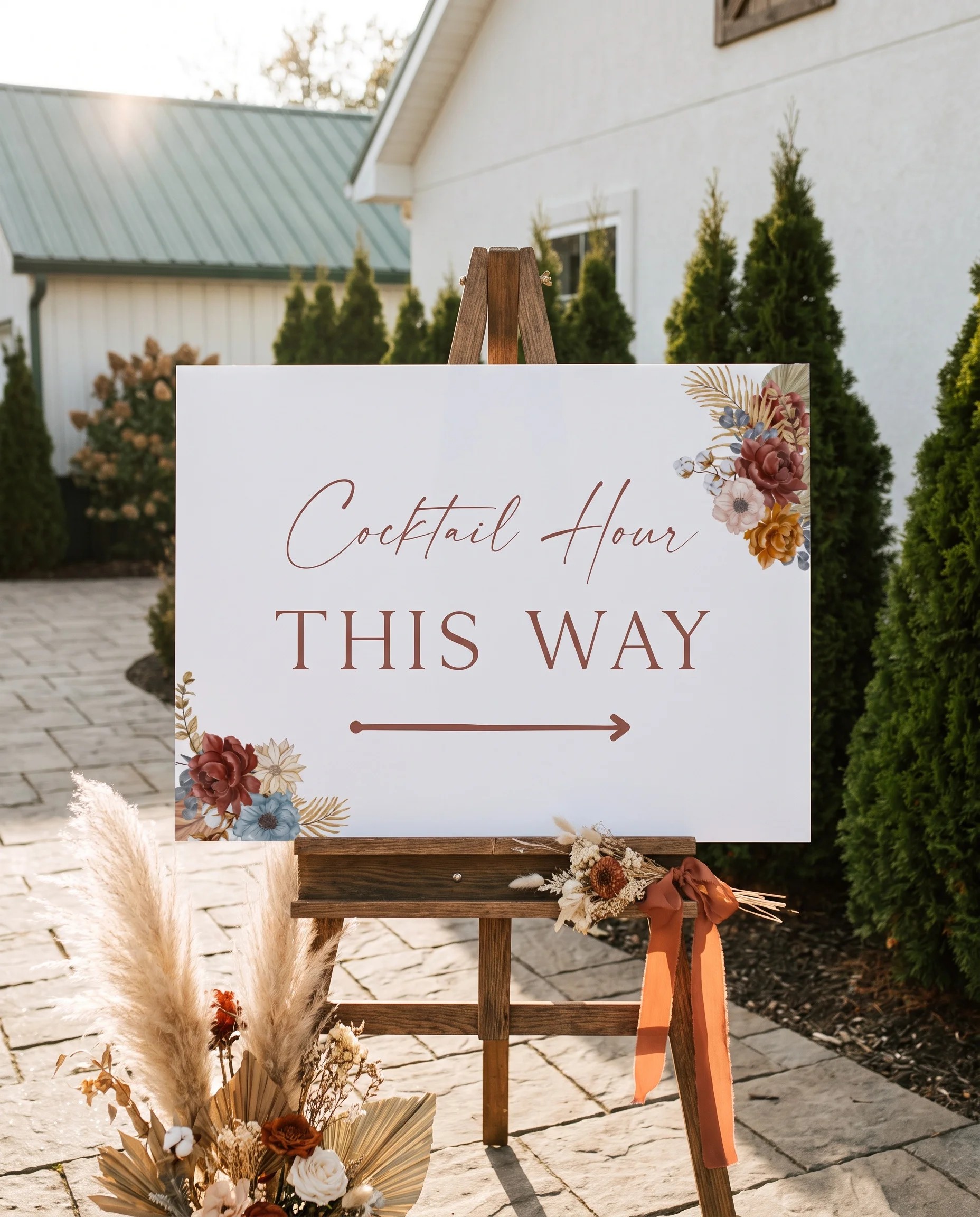 Marisol Bloom wedding cocktail hour sign — displayed on an easel under soft natural light with a slight overhead angle, wedding signs.
