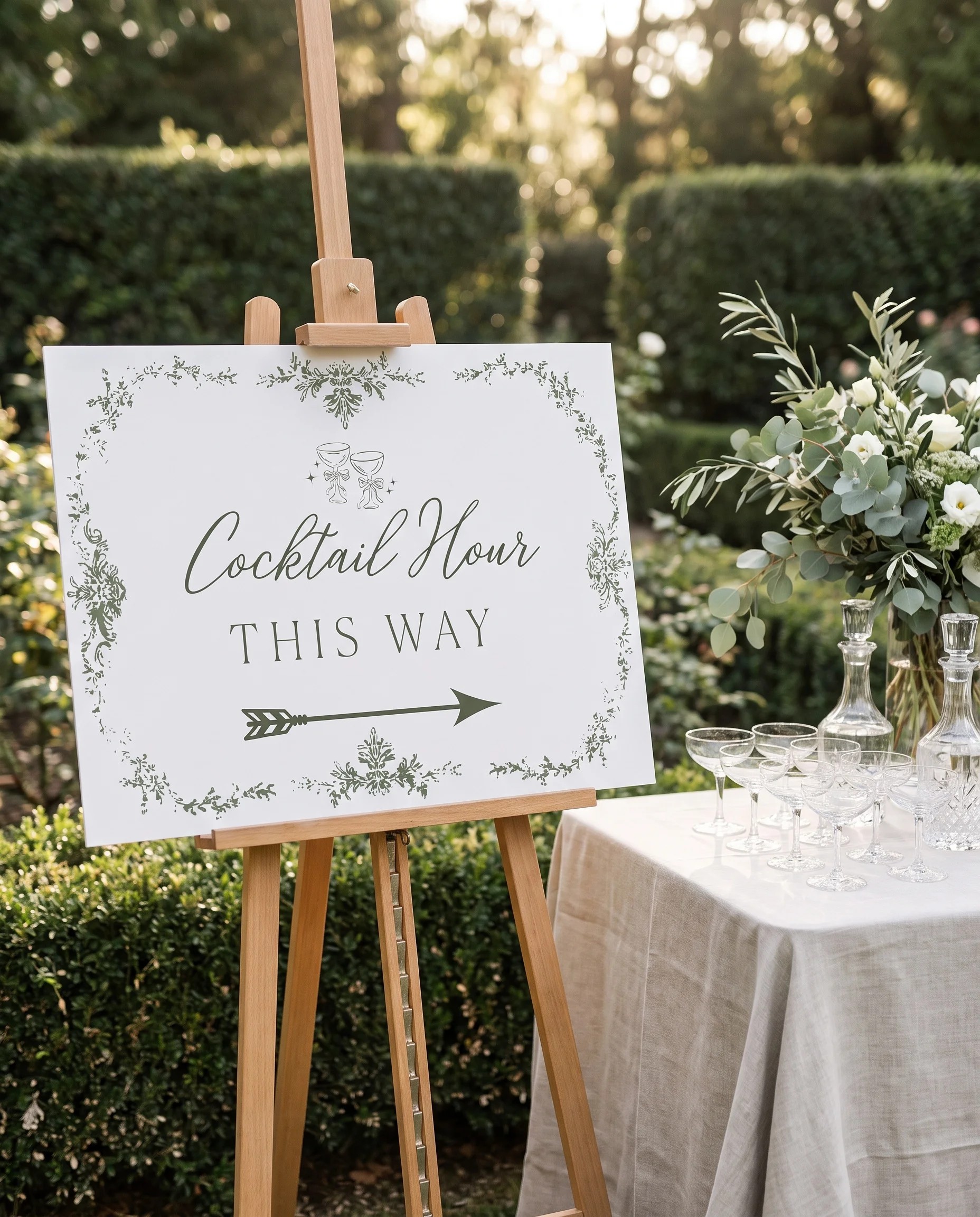 Sage Crest wedding cocktail hour sign — shown beside a drinks station under soft natural light, slight overhead angle, cocktail hour sign.
