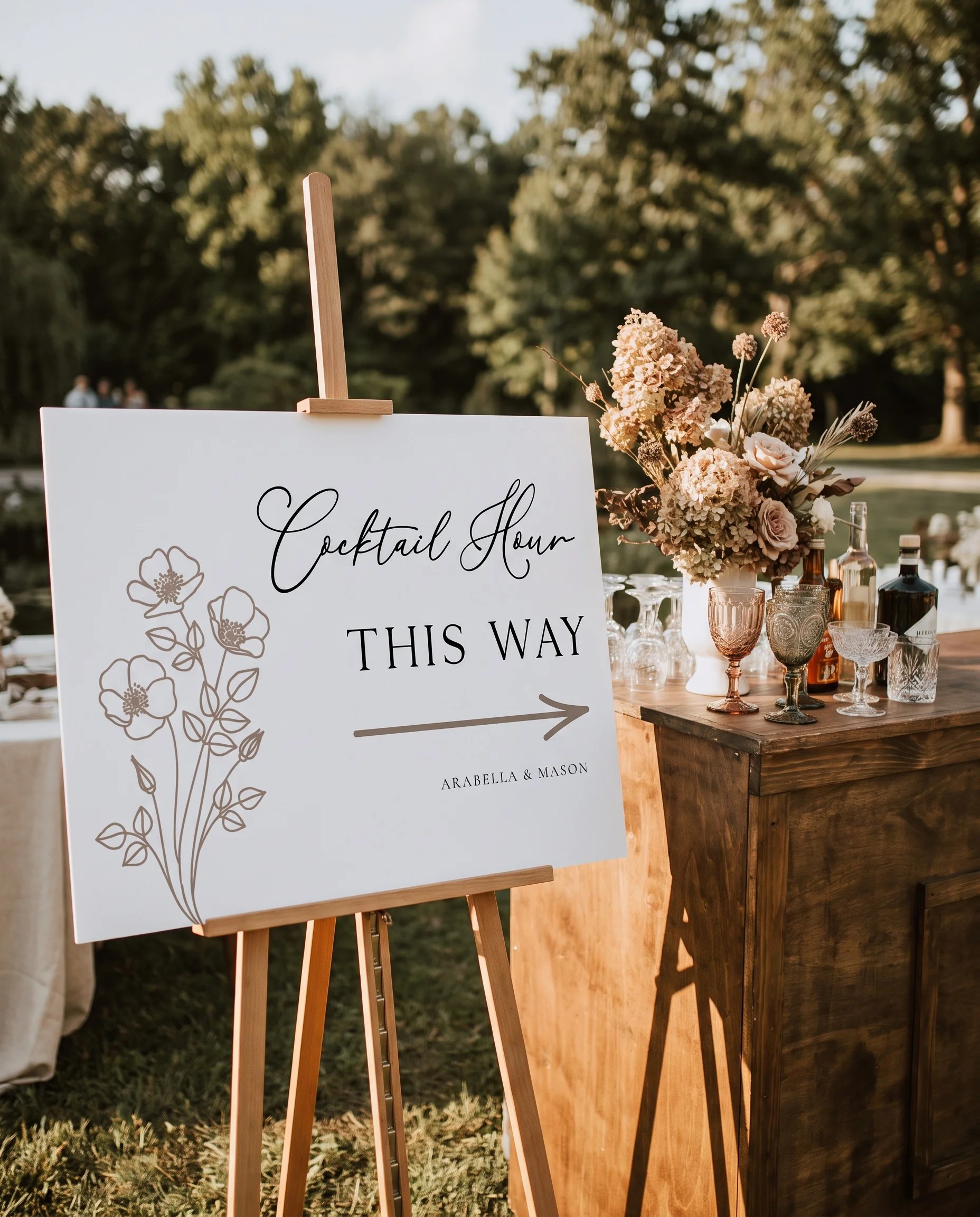 Anemora wedding cocktail hour sign — shown beside a drinks station on premium editorial paper under soft natural light, cocktail hour sign.