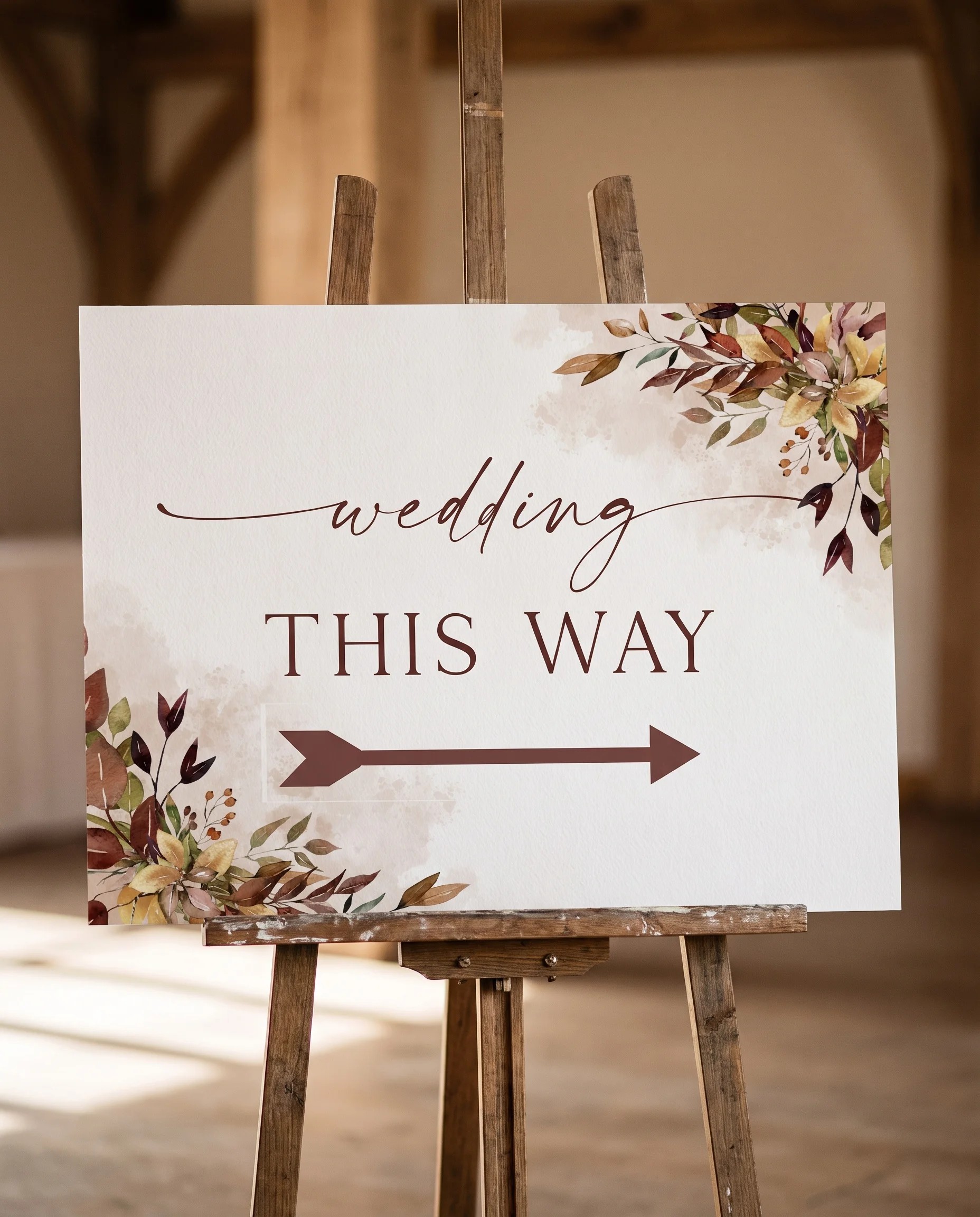 Autumn Bough wedding directional sign — displayed on an easel under soft natural light at a slight overhead angle, wedding signs