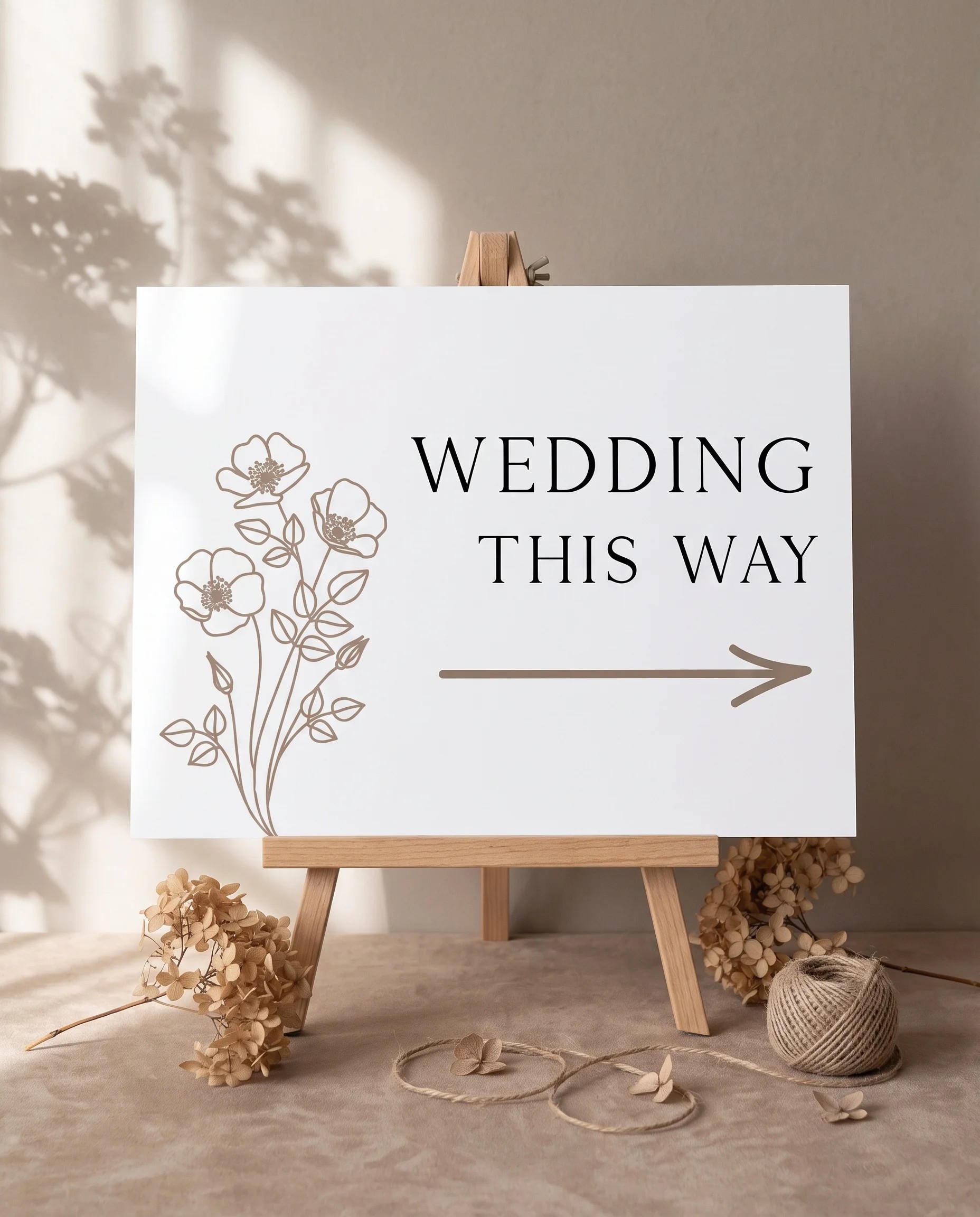 Anemora wedding directional sign — displayed on an easel under soft natural light at a slight overhead angle, wedding signs