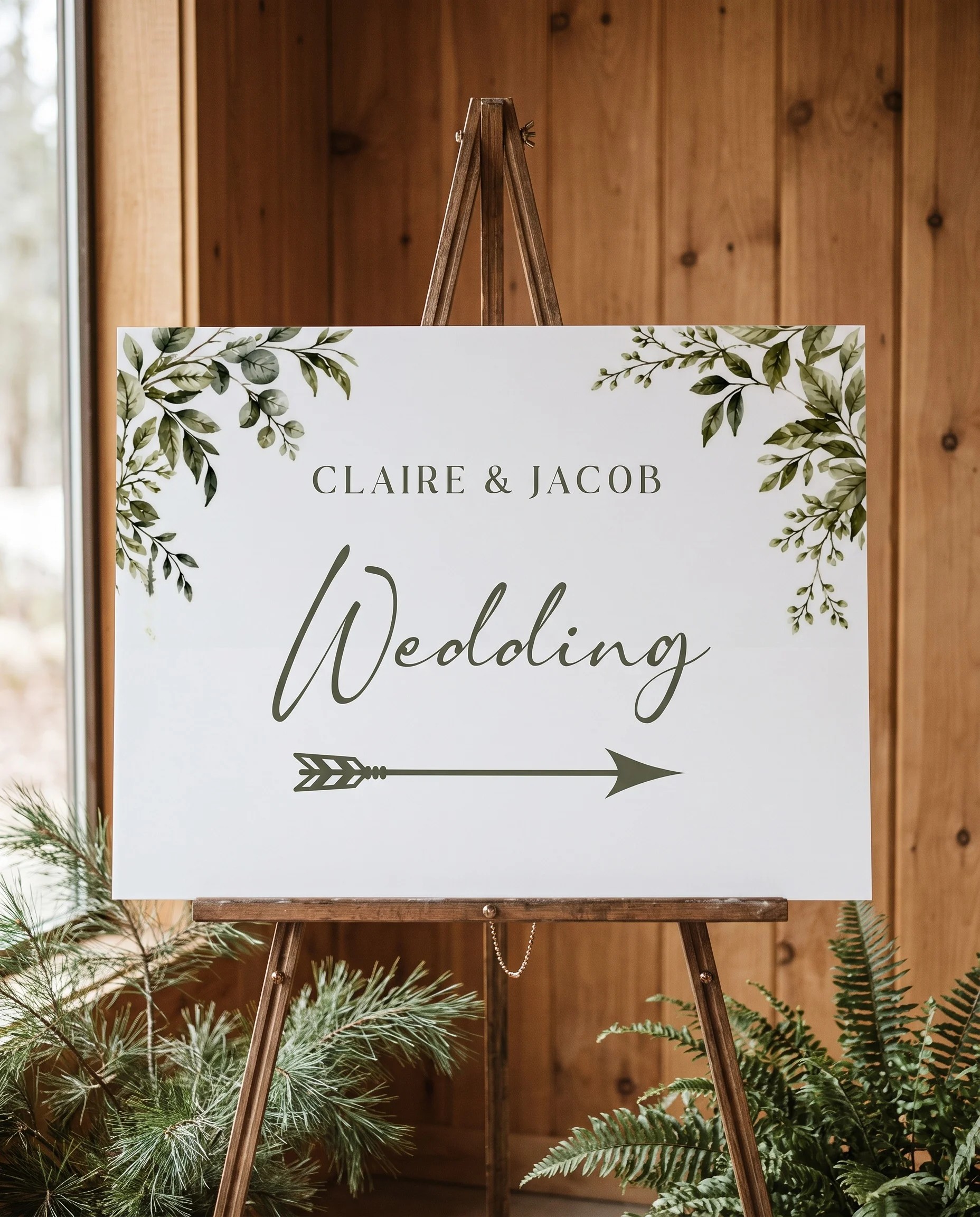 Canopy Grove wedding directional sign — displayed on an easel under soft natural light at a slight overhead angle, wedding signs