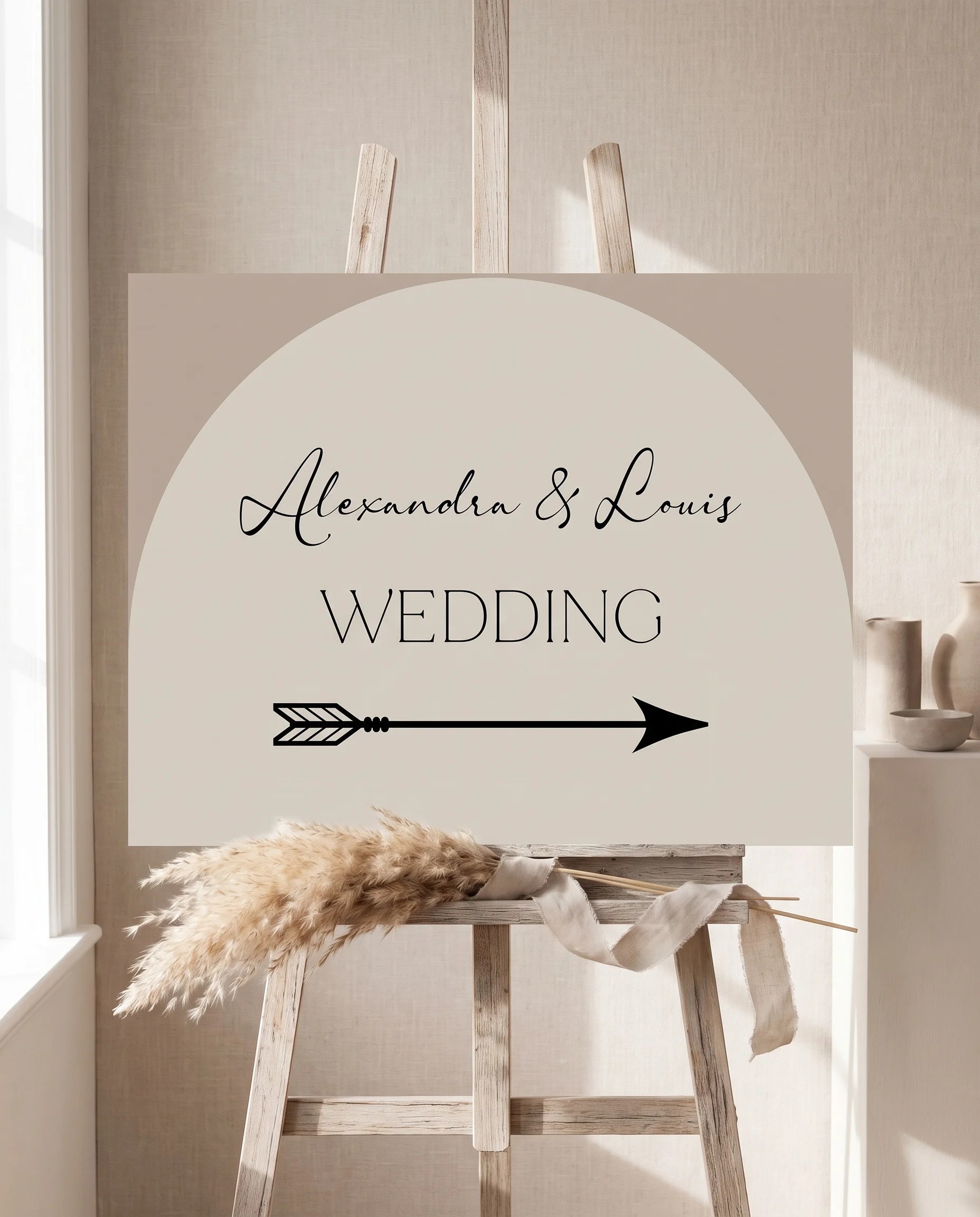Tassel Arc wedding directional sign — displayed on an easel under soft natural light with a slight overhead angle, wedding signs