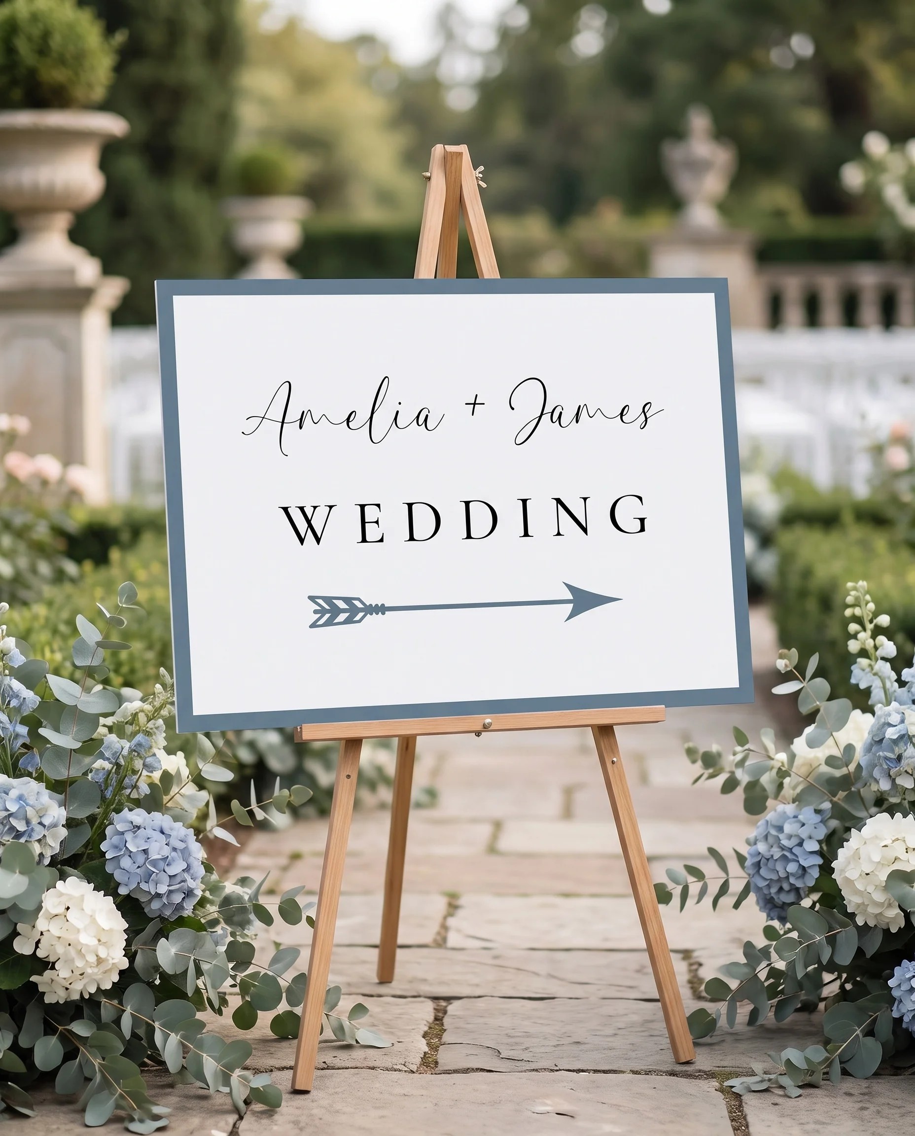 Arrow Crest wedding directional sign — displayed in a wedding venue setting under soft natural light with a slight overhead angle, wedding signage.