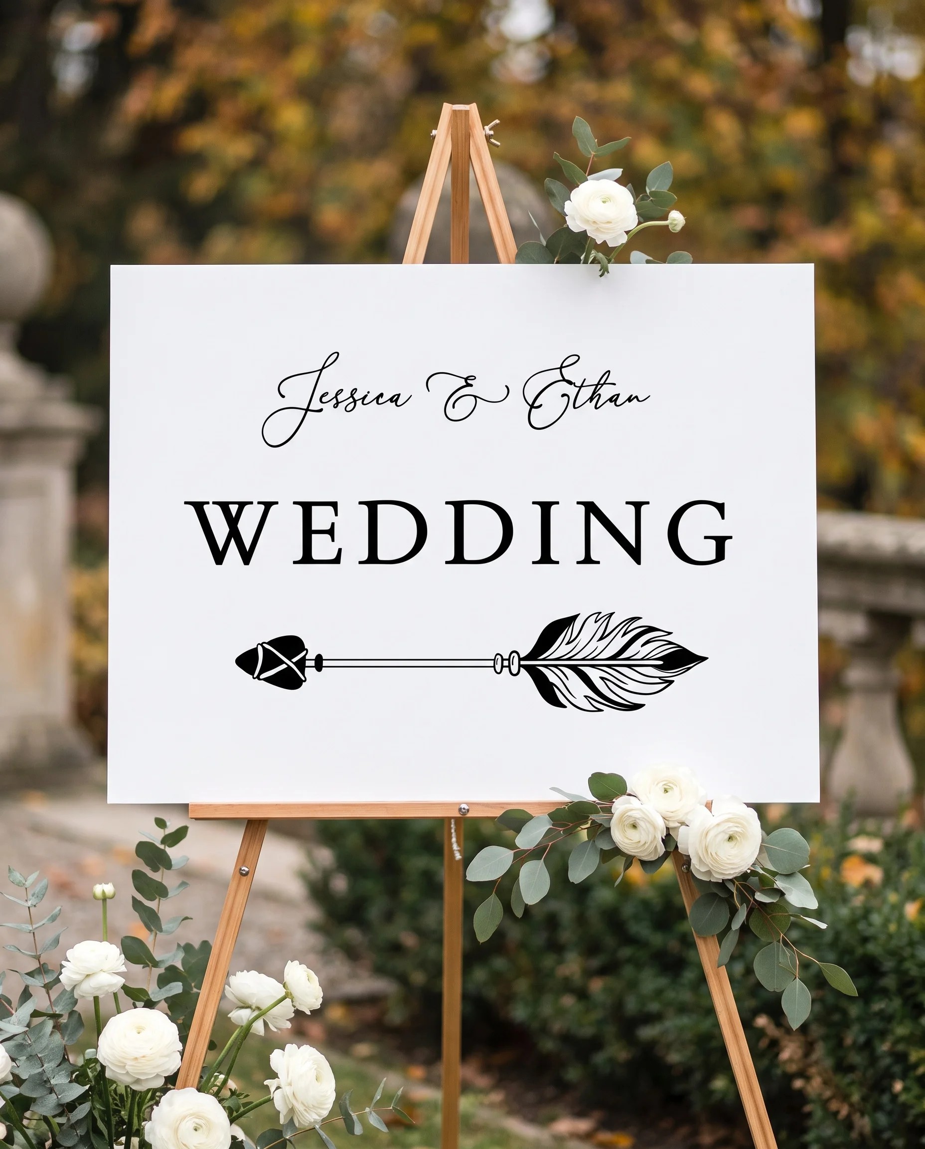 Monochrome Veil wedding directional sign — displayed in a wedding venue setting with soft natural overhead light, wedding signage.