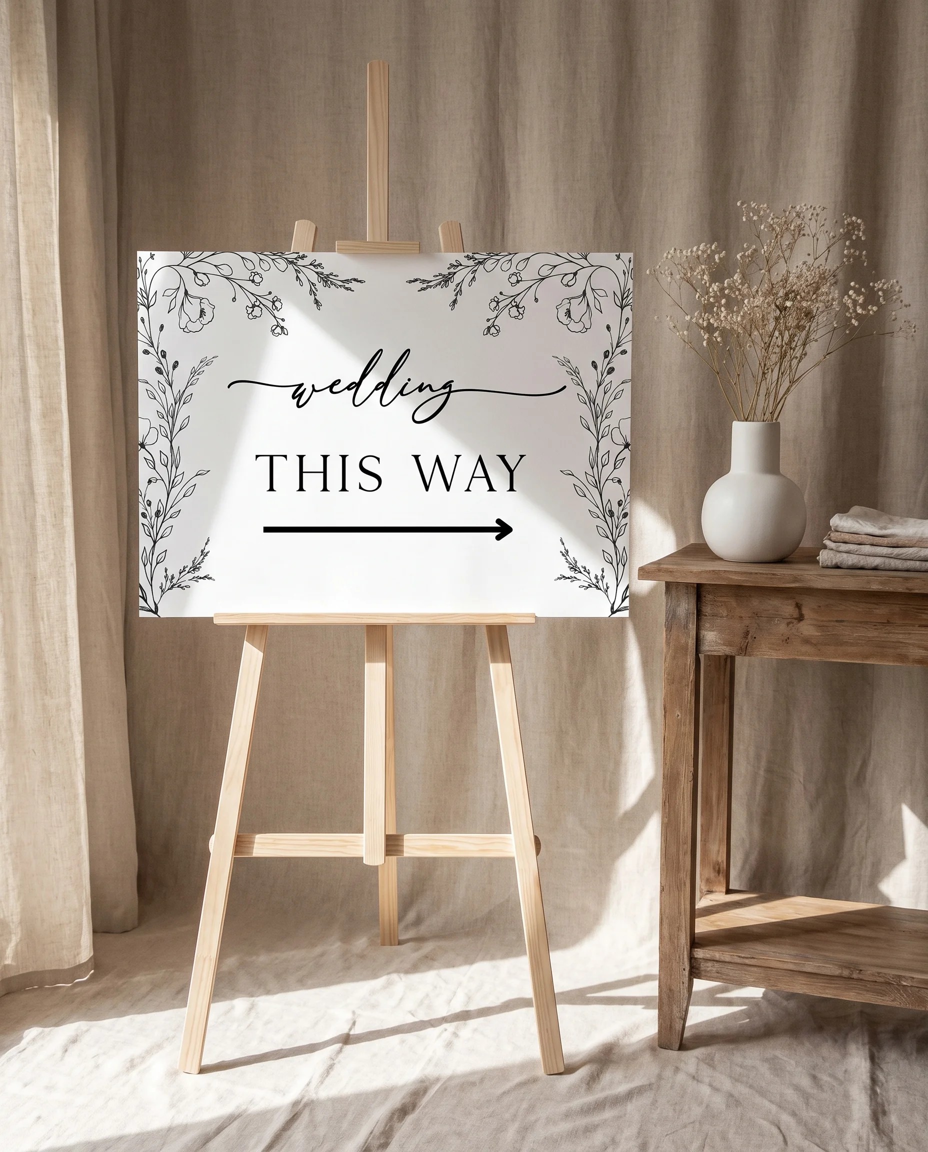 Meadow Sprig wedding directional sign — shown on premium editorial paper under soft natural light from a slight overhead angle, printable wedding signs.