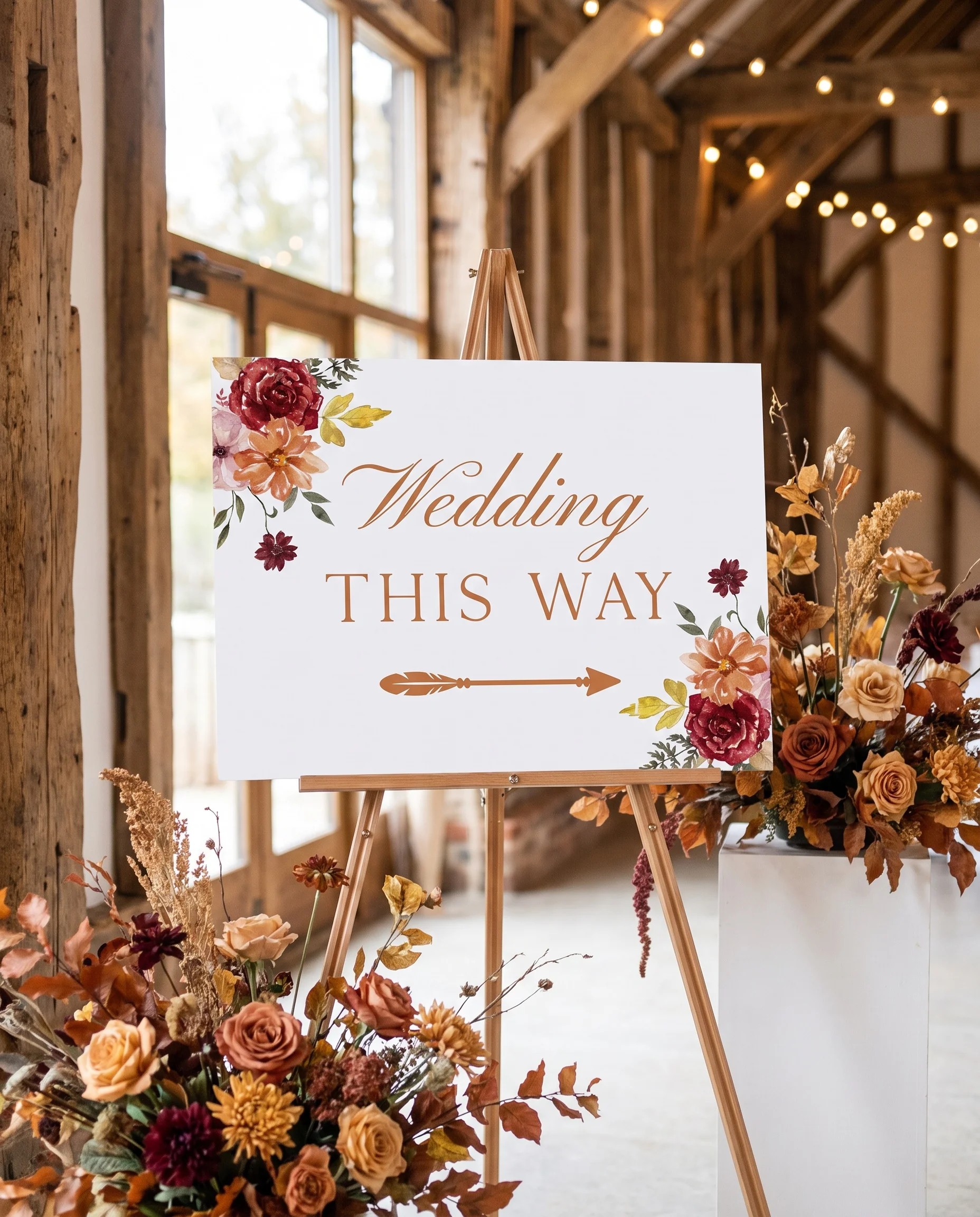Ember Bloom wedding directional sign — page shown at a slight overhead angle in soft natural light, wedding signage