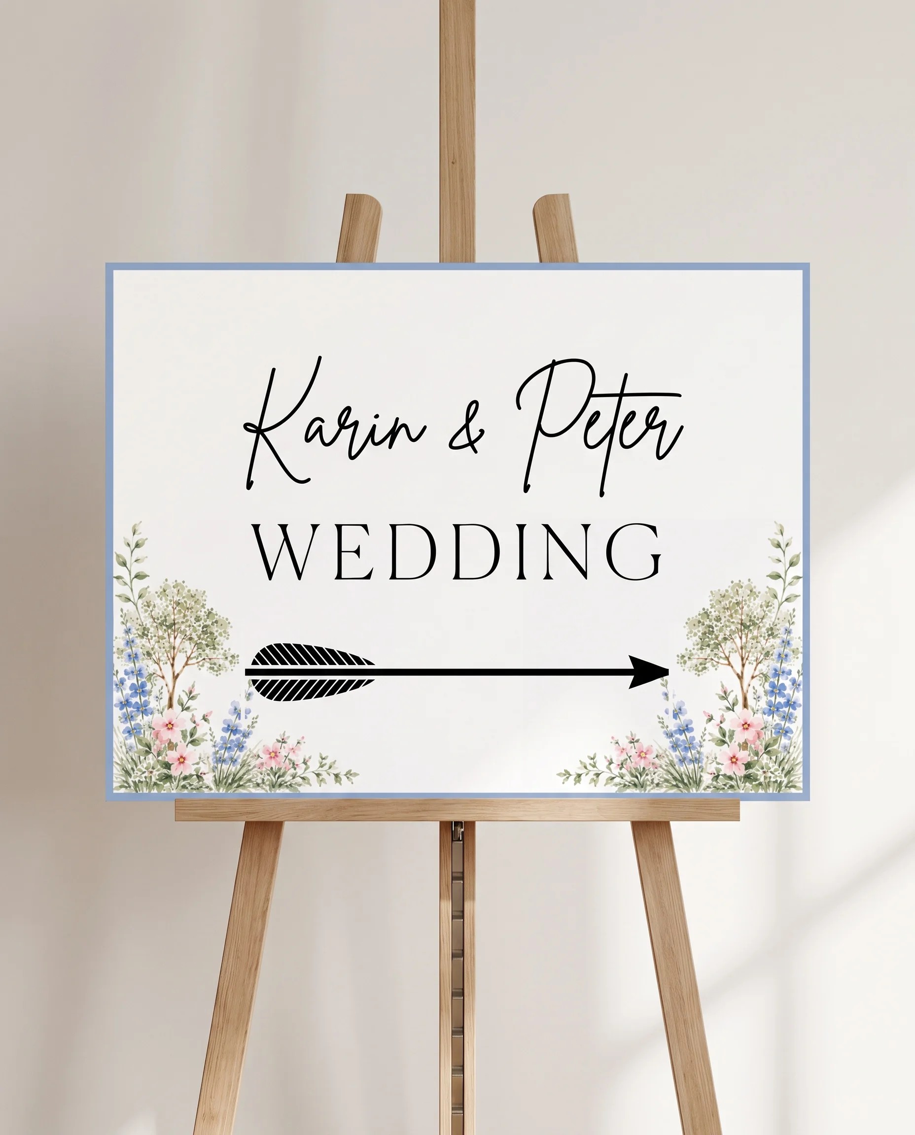 Meadow Spire wedding directional sign — displayed on an easel under soft natural light at a slight overhead angle, wedding signs