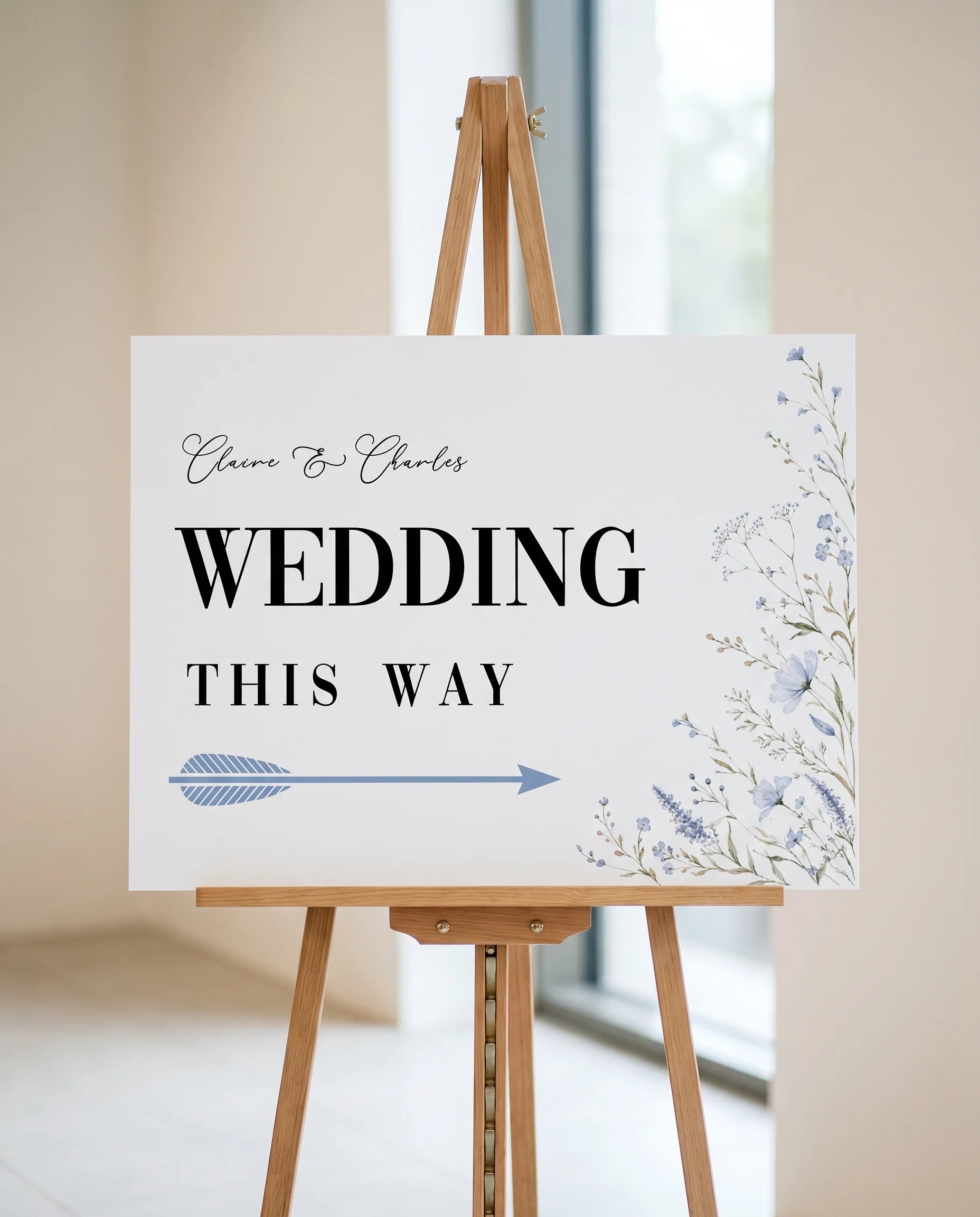 Azure Sprig wedding directional sign — shown beside furniture for scale under soft natural light, printable wedding signs.