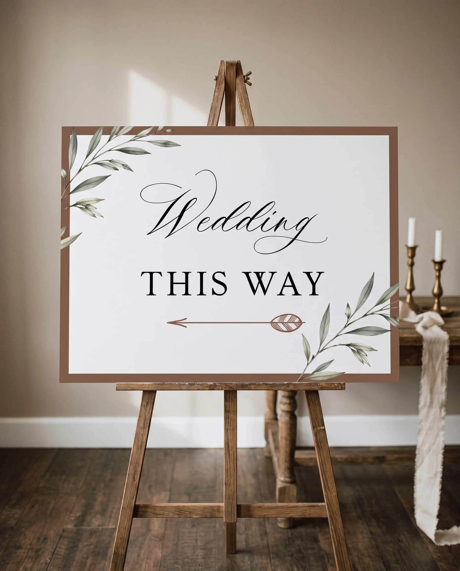Olive Arc wedding directional sign — displayed on an easel under soft natural light at a slight overhead angle, wedding signs
