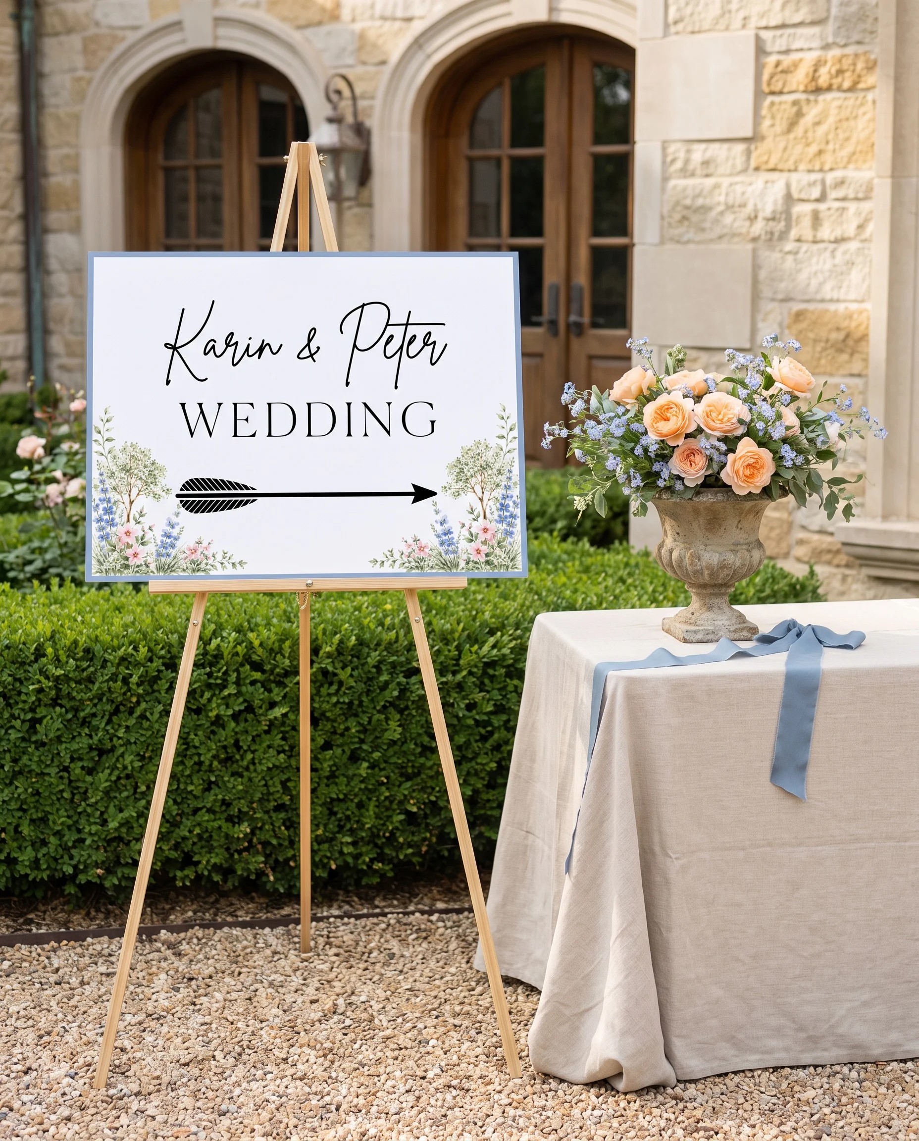 Meadow Spire wedding directional sign — displayed beside furniture for scale on premium paper under soft natural light, printable wedding signs.