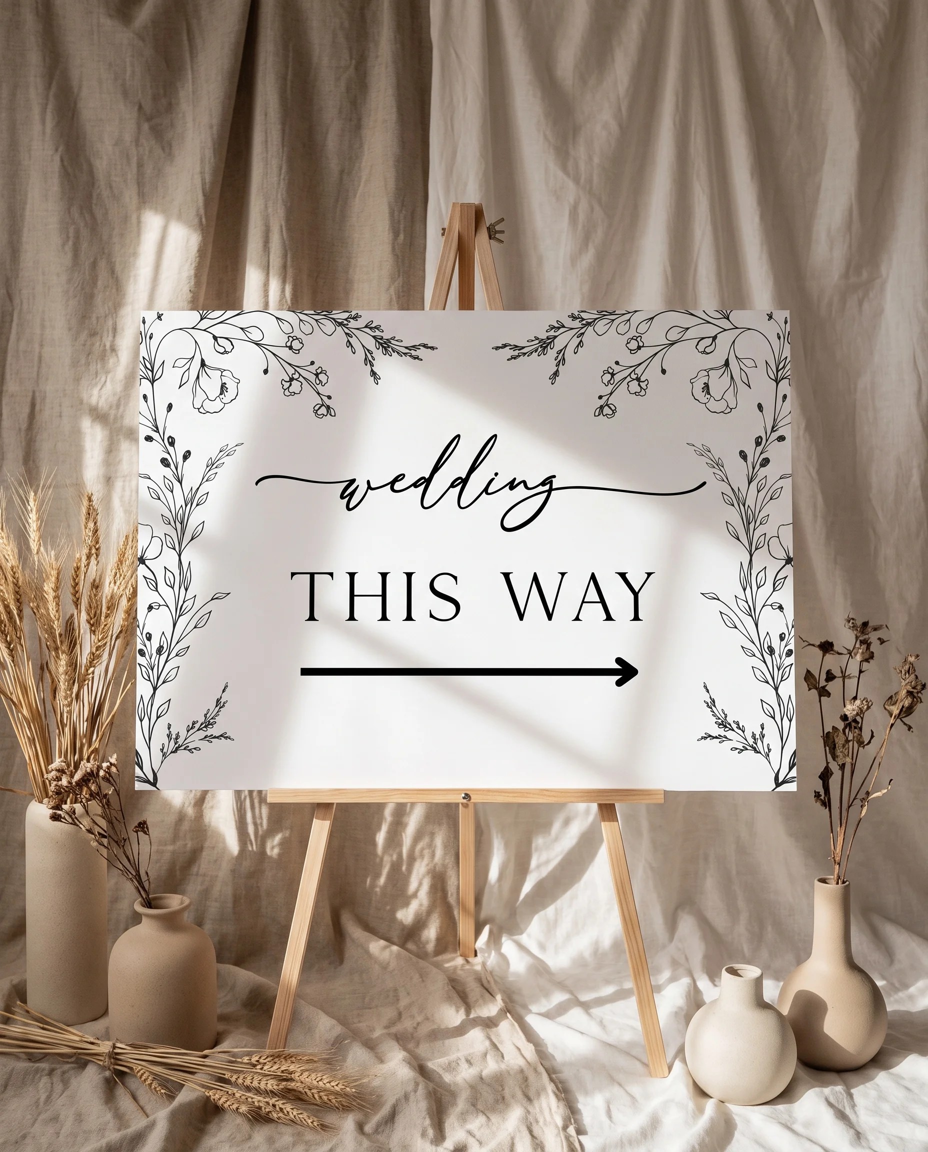 Meadow Sprig wedding directional sign — displayed on an easel under soft natural light at a slight overhead angle, wedding signs