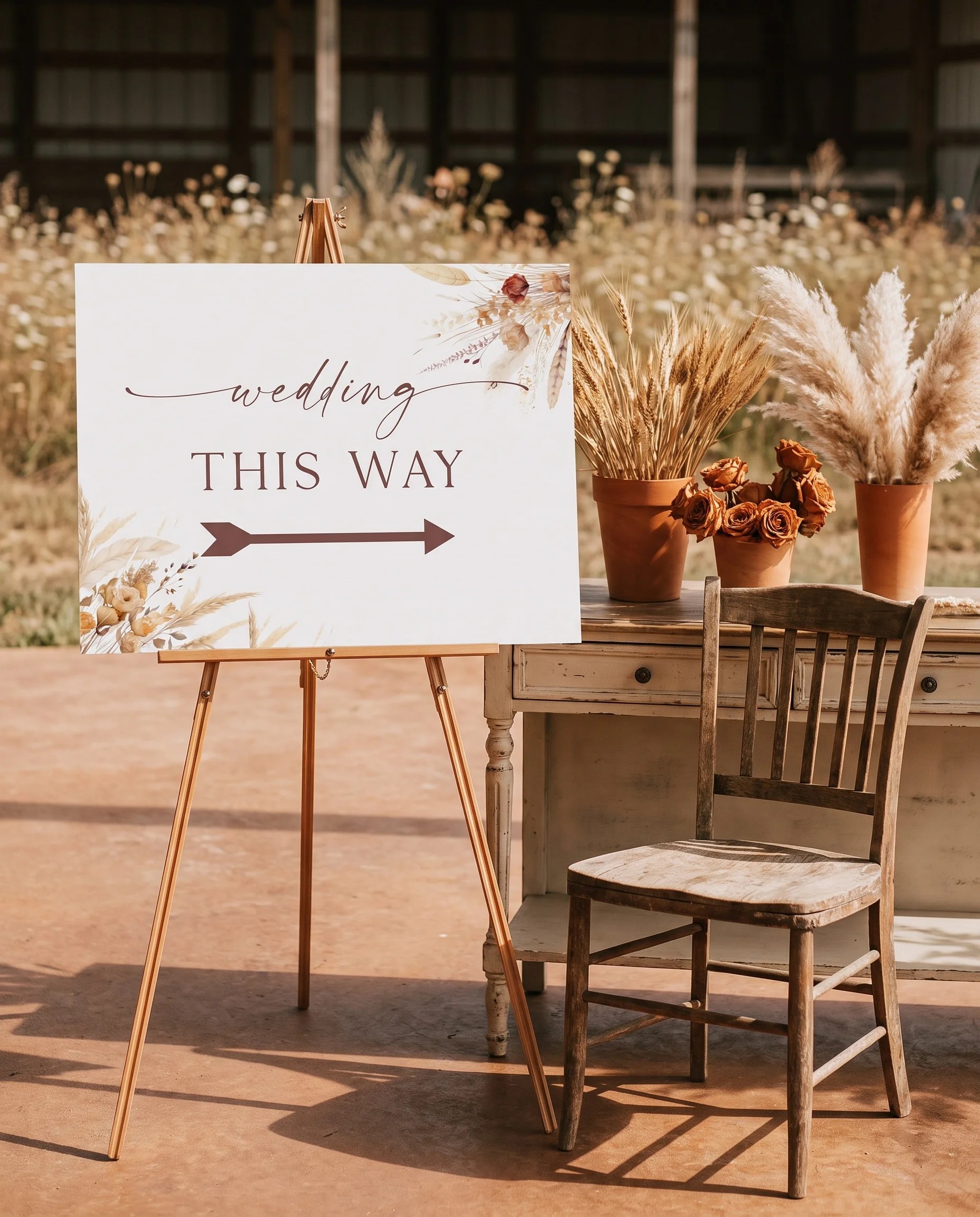 Harvest Script wedding directional sign — shown beside furniture for scale on premium editorial paper in soft natural light, printable wedding signs.