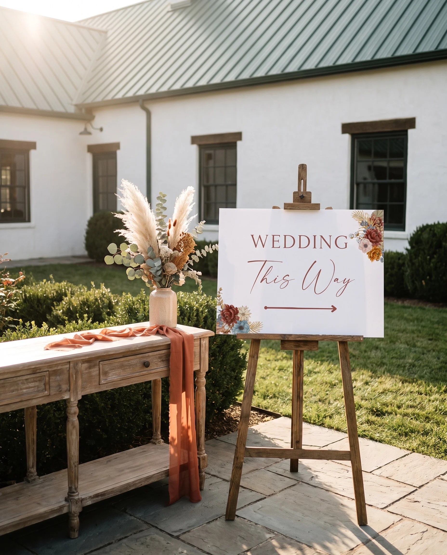 Marisol Bloom wedding directional sign — shown beside furniture for scale on premium editorial paper under soft natural light, printable wedding signs.