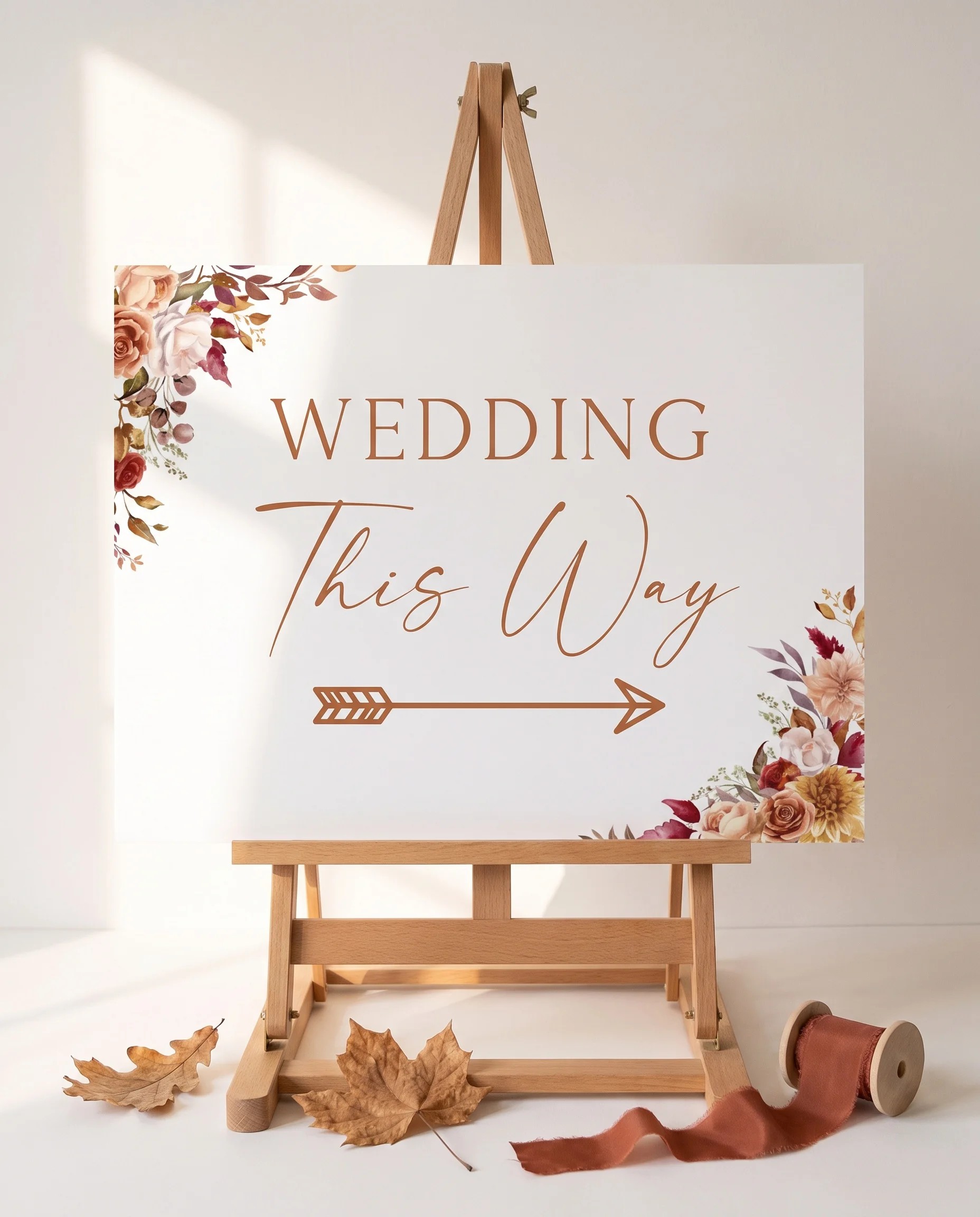Autumn Bloom wedding directional sign — displayed on an easel under soft natural light at a slight overhead angle, wedding signs