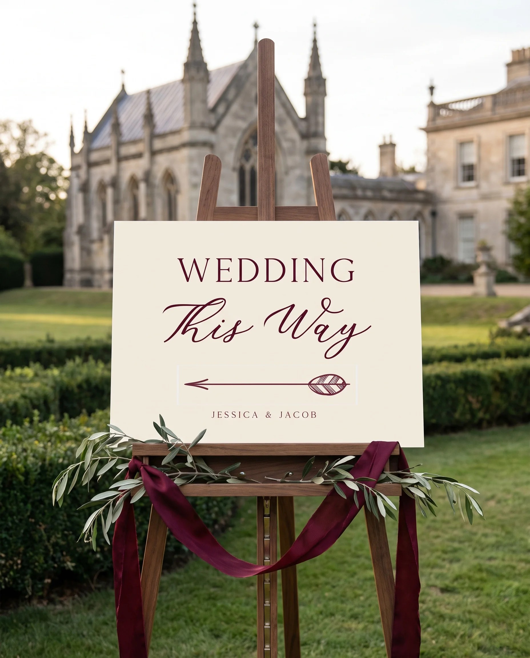 Claret Vine wedding directional sign — displayed on an easel under soft natural light at a slight overhead angle, wedding signs