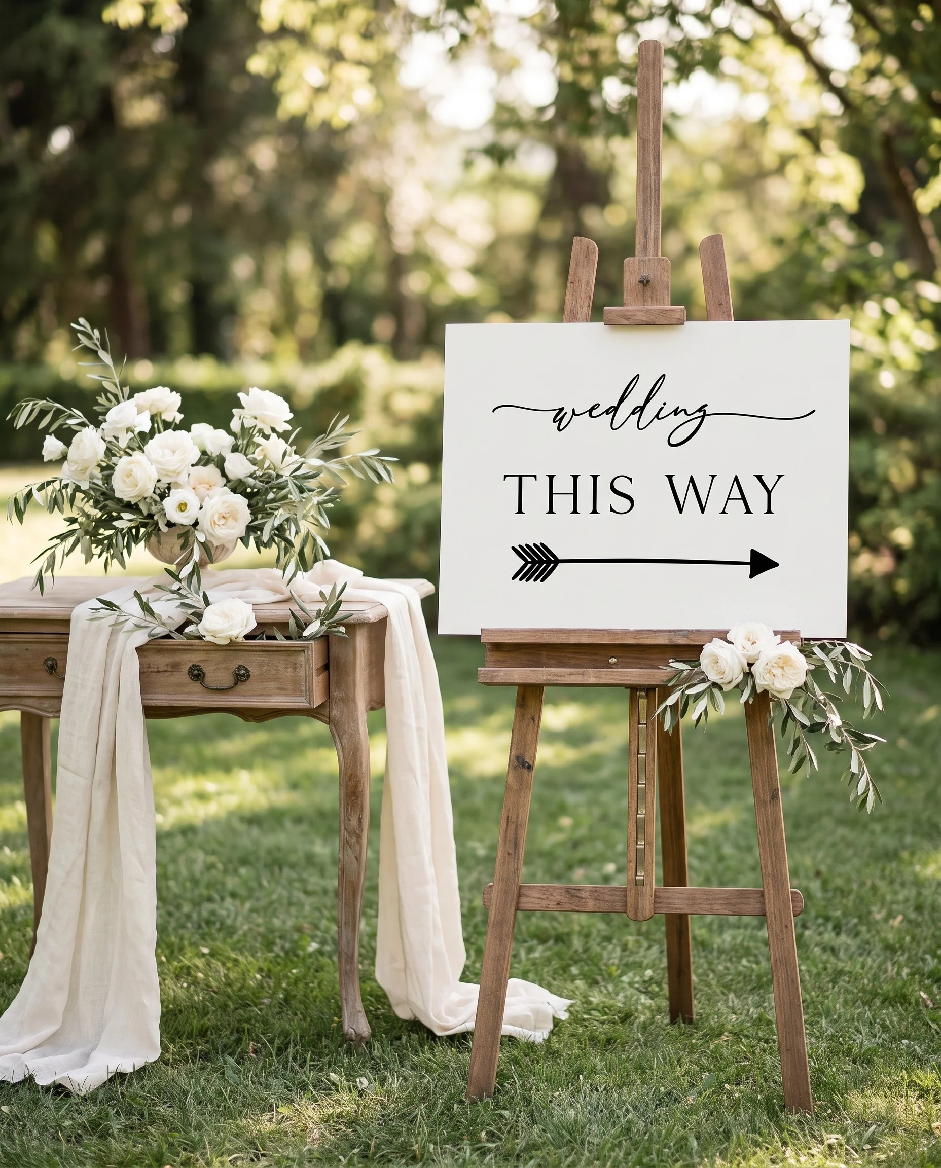 Quiet Line wedding directional sign — shown beside furniture for scale on premium editorial paper in soft natural light, printable wedding signs