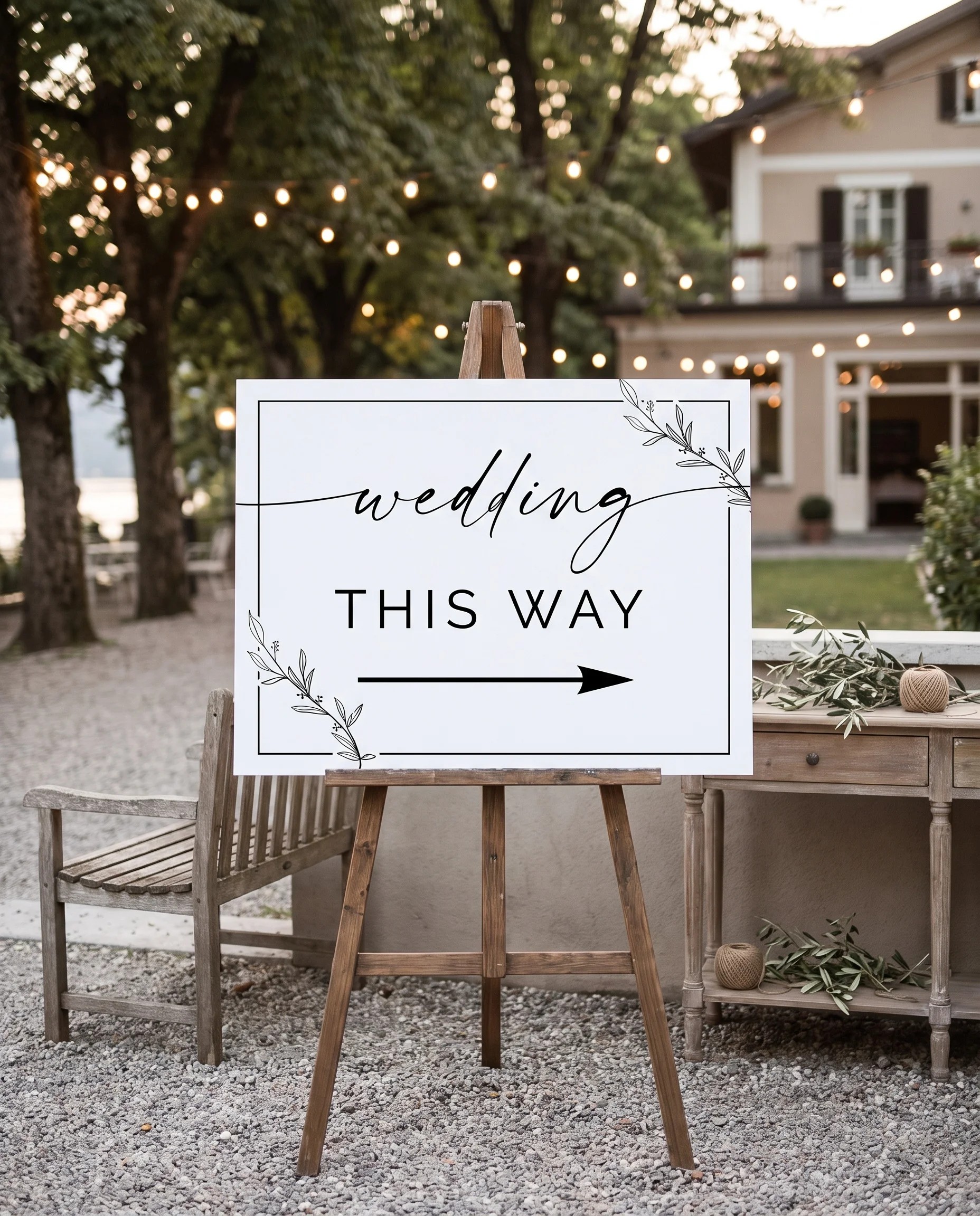 Willow Script wedding directional sign — shown beside furniture for scale on premium paper under soft natural light, printable wedding signs