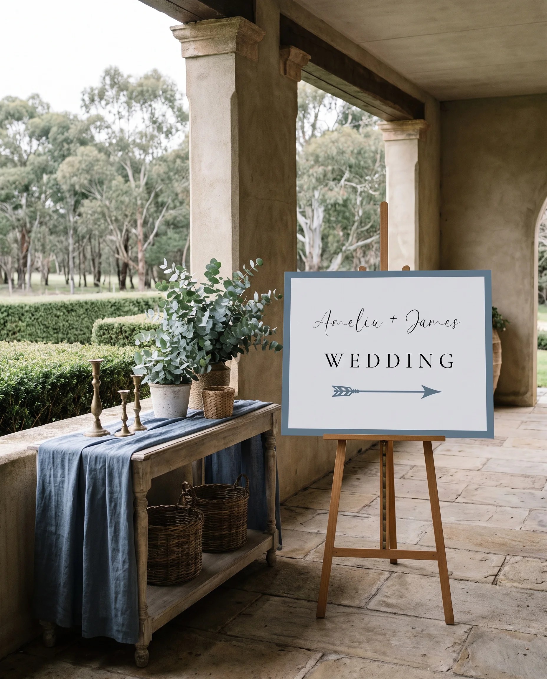 Arrow Crest wedding directional sign — shown beside furniture for scale on premium editorial paper under soft natural light, printable wedding signs.