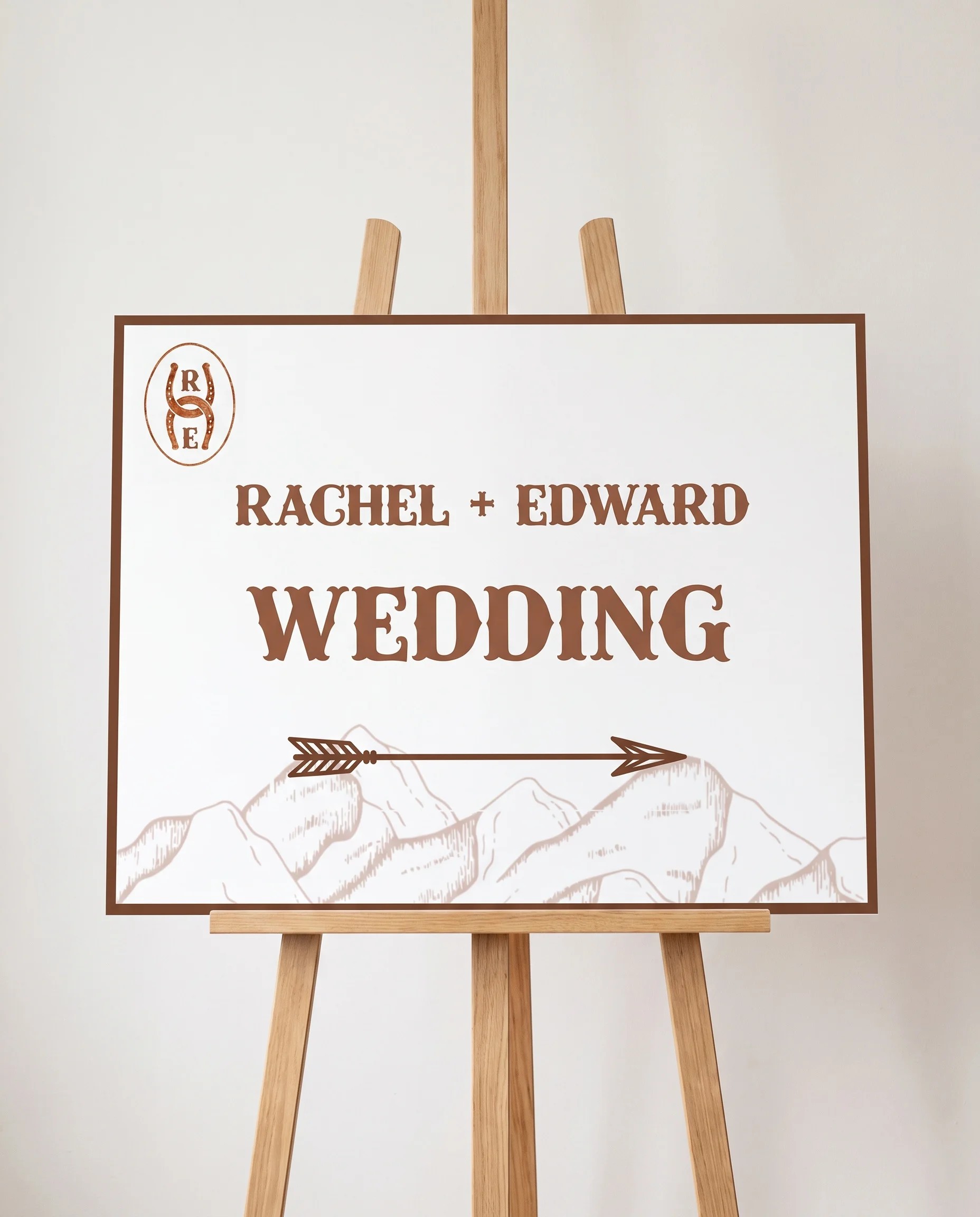 Saddle Crest wedding directional sign — displayed on an easel under soft natural light with a slight overhead angle, wedding signs