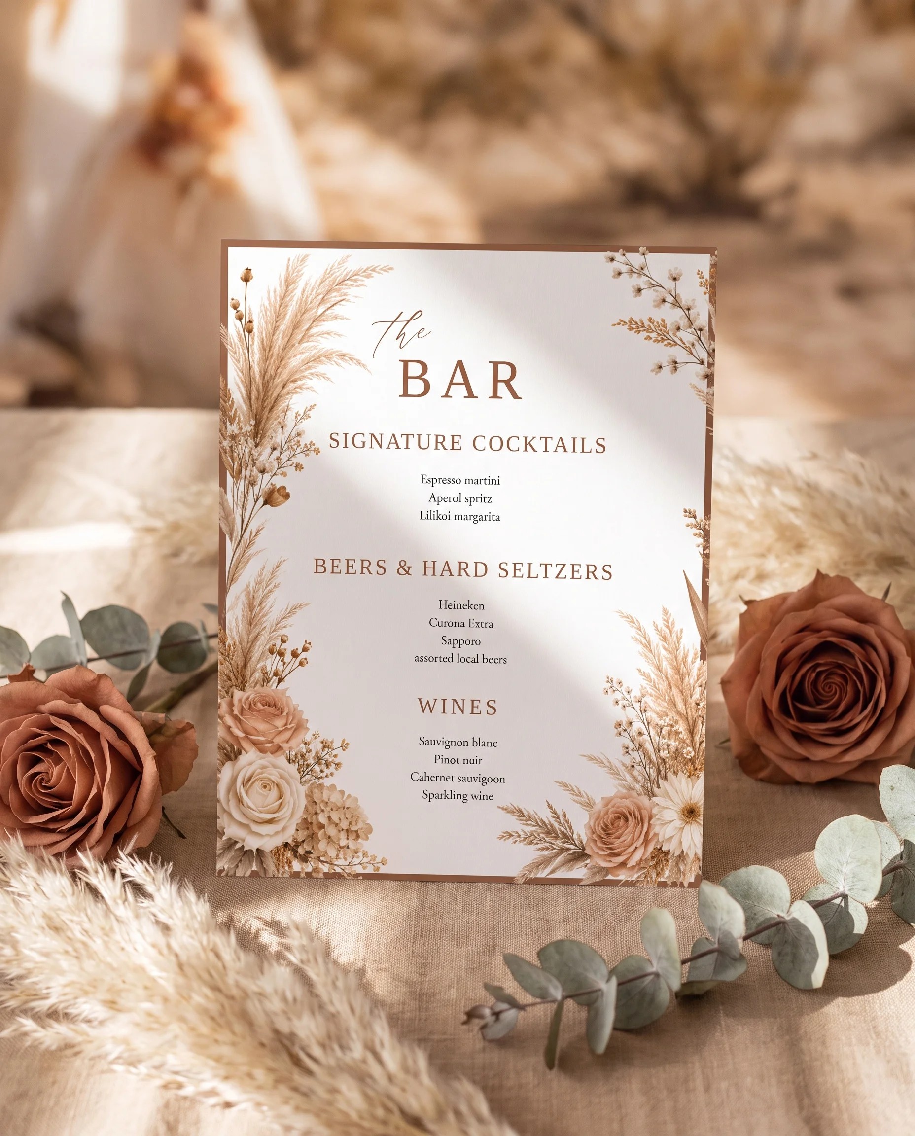 Pampas Hush — bar menu displayed upright on premium editorial paper under soft natural light, shot from a slight overhead angle, wedding bar sign.