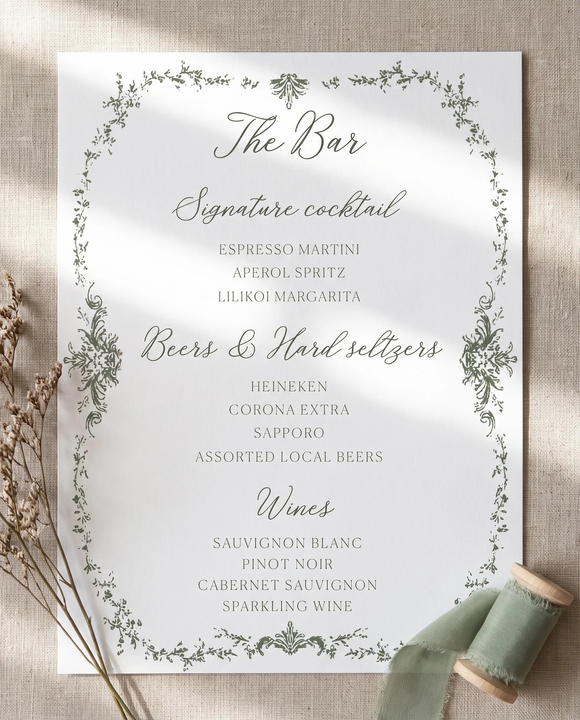 Sage Crest — bar menu page shown flat on premium editorial paper under soft natural light, slight overhead angle, wedding bar menu.