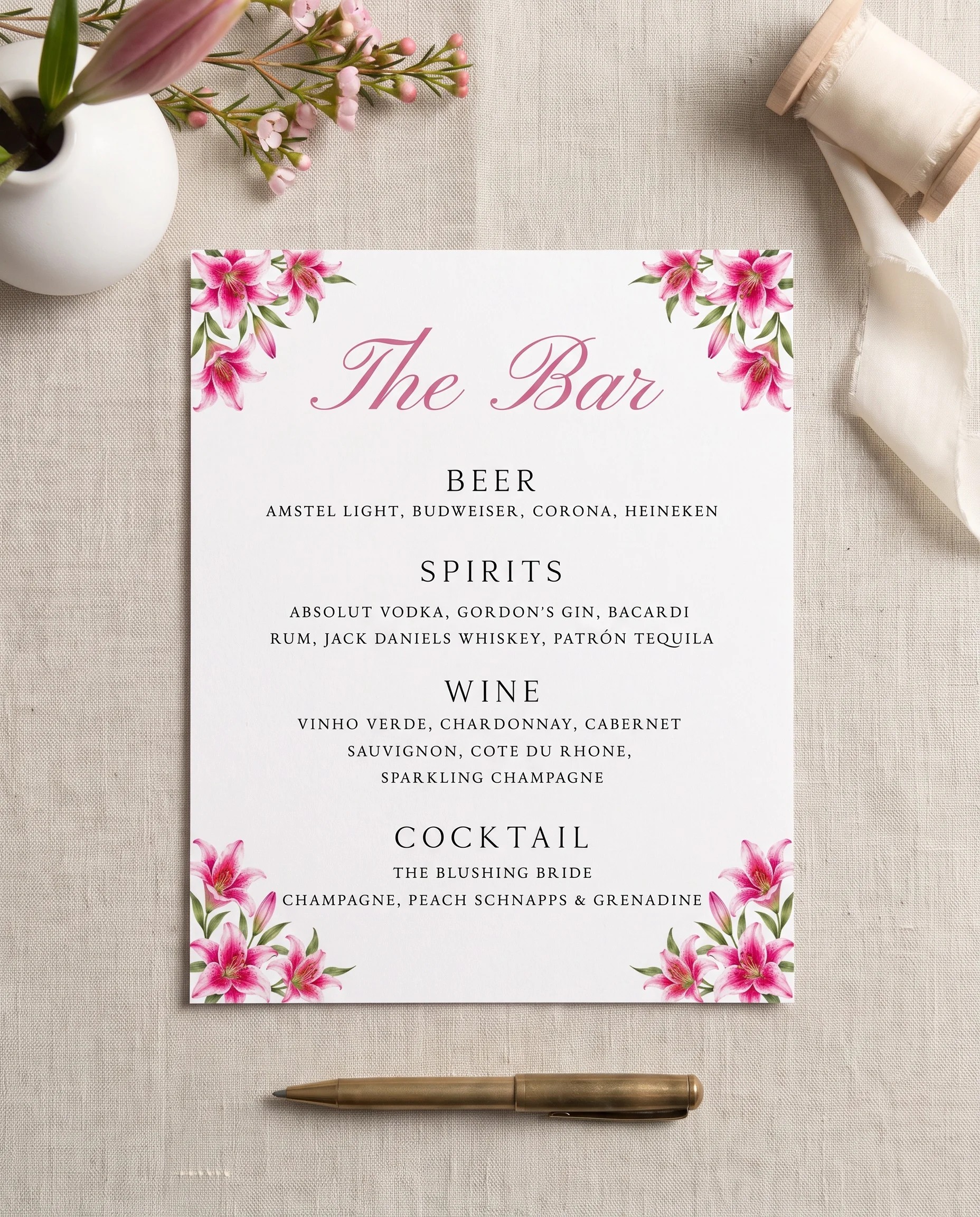 Lily Bloom — bar menu page shown flat on premium editorial paper under soft natural light, slight overhead angle, wedding bar menu.