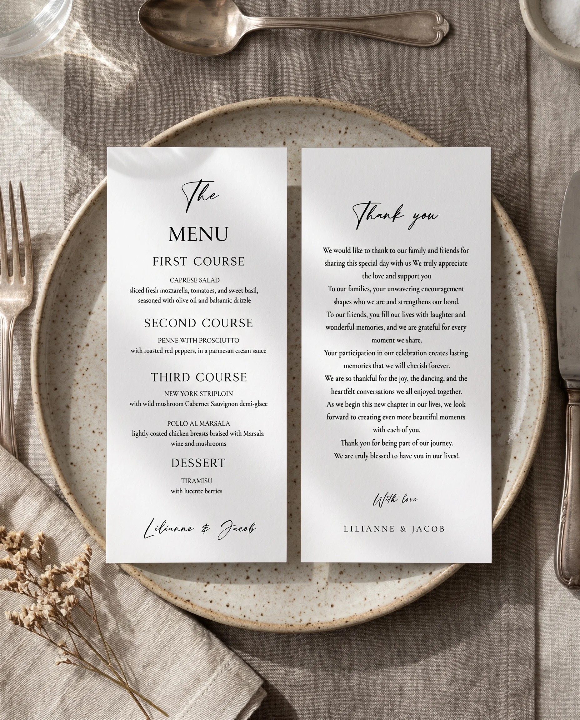 Tonal Reply wedding menu — menu and thank you card resting on a plate at a place setting under soft overhead light, wedding menu cards.