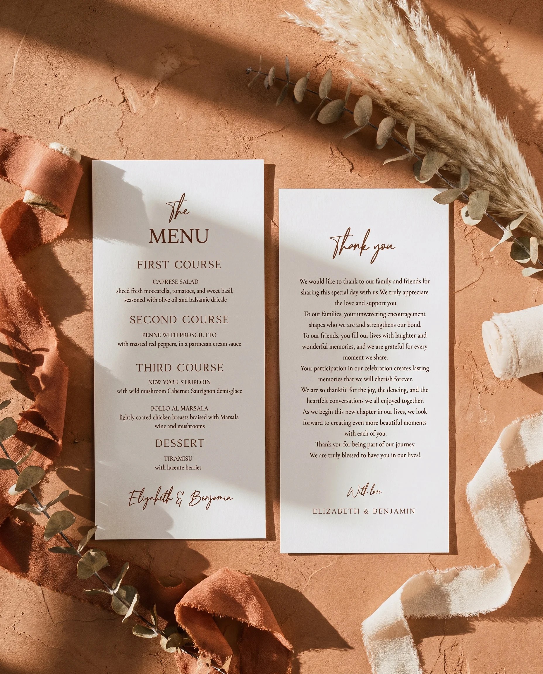 Briar Script wedding menu — two menu pages laid flat on premium paper under soft natural light with a slight overhead angle, wedding menu