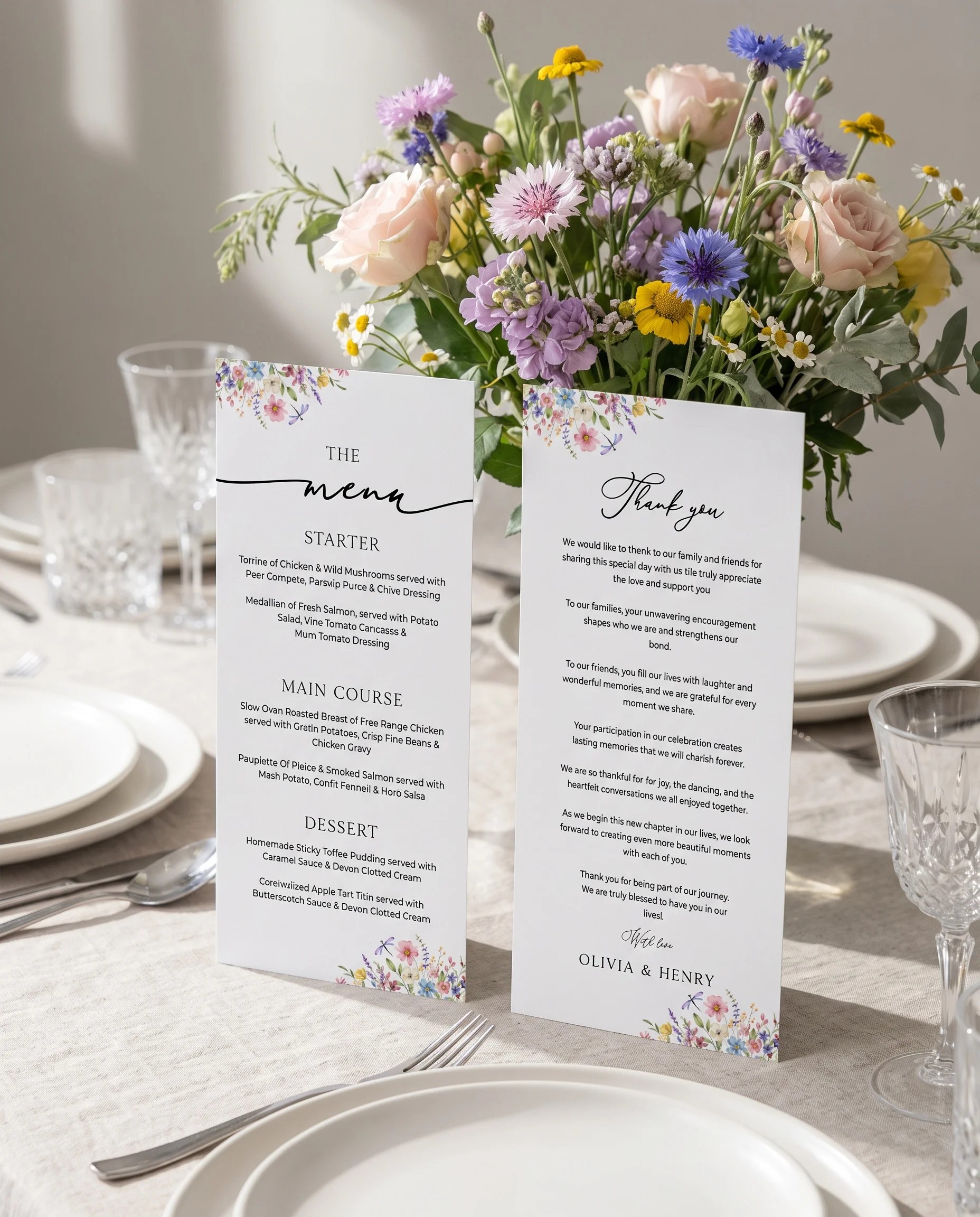 Meadowlark wedding menu — two menu pages standing upright on a reception table in soft natural light, wedding menu template.
