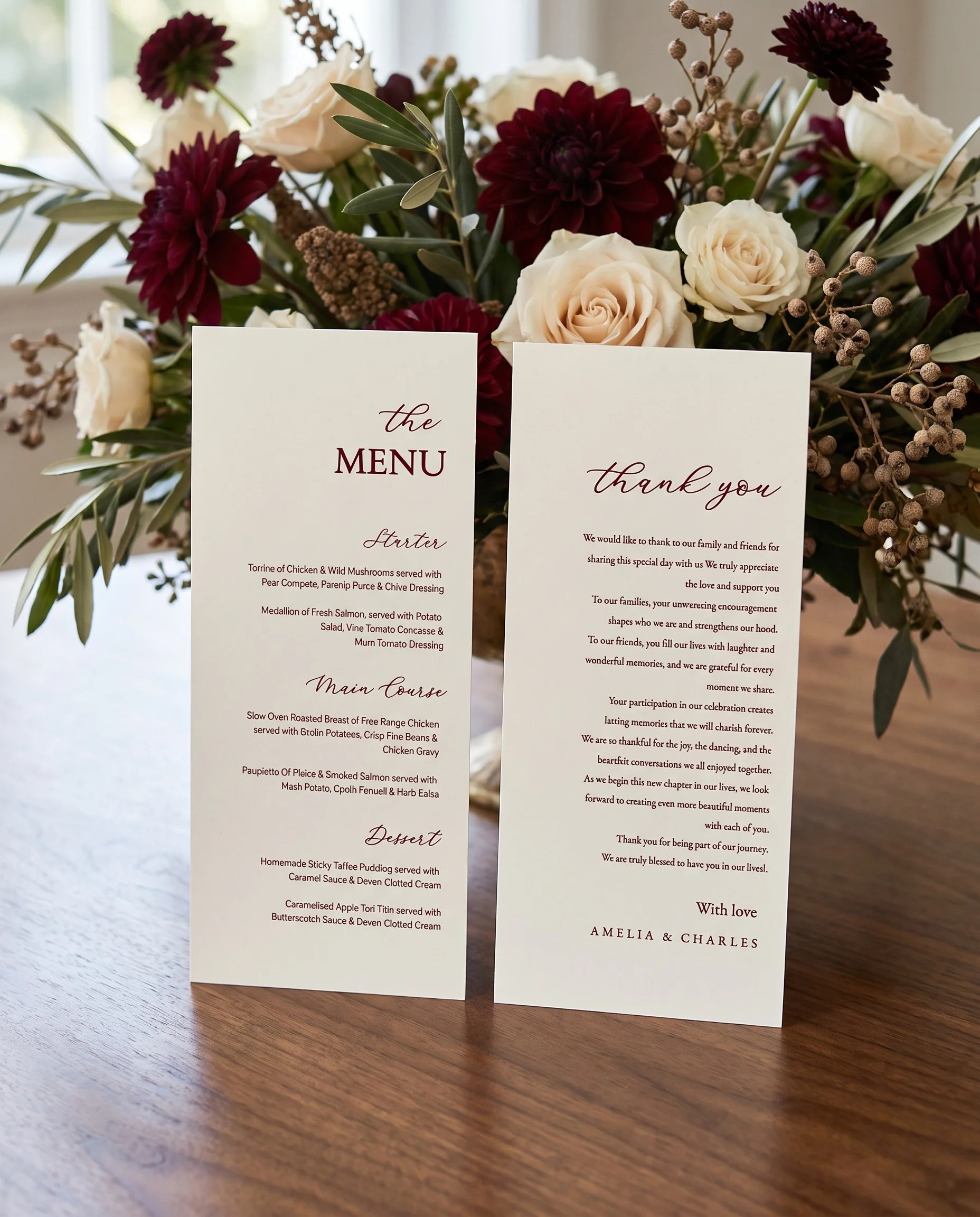 Claret Vine wedding menu — two menu pages standing upright on a reception table under soft natural light, wedding menu template.