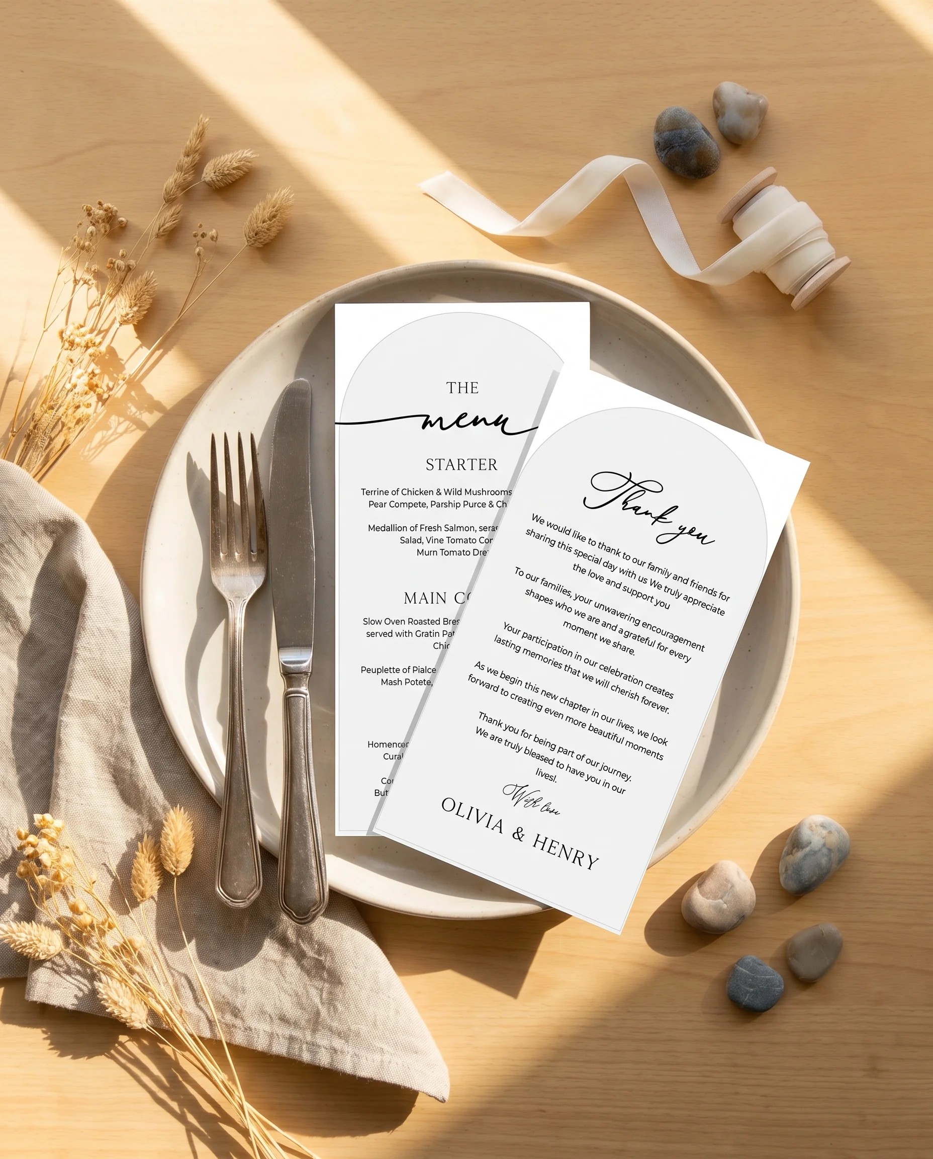 Halo Arch wedding menu — menu and thank you card resting on a plate at a set place setting, wedding menu cards.