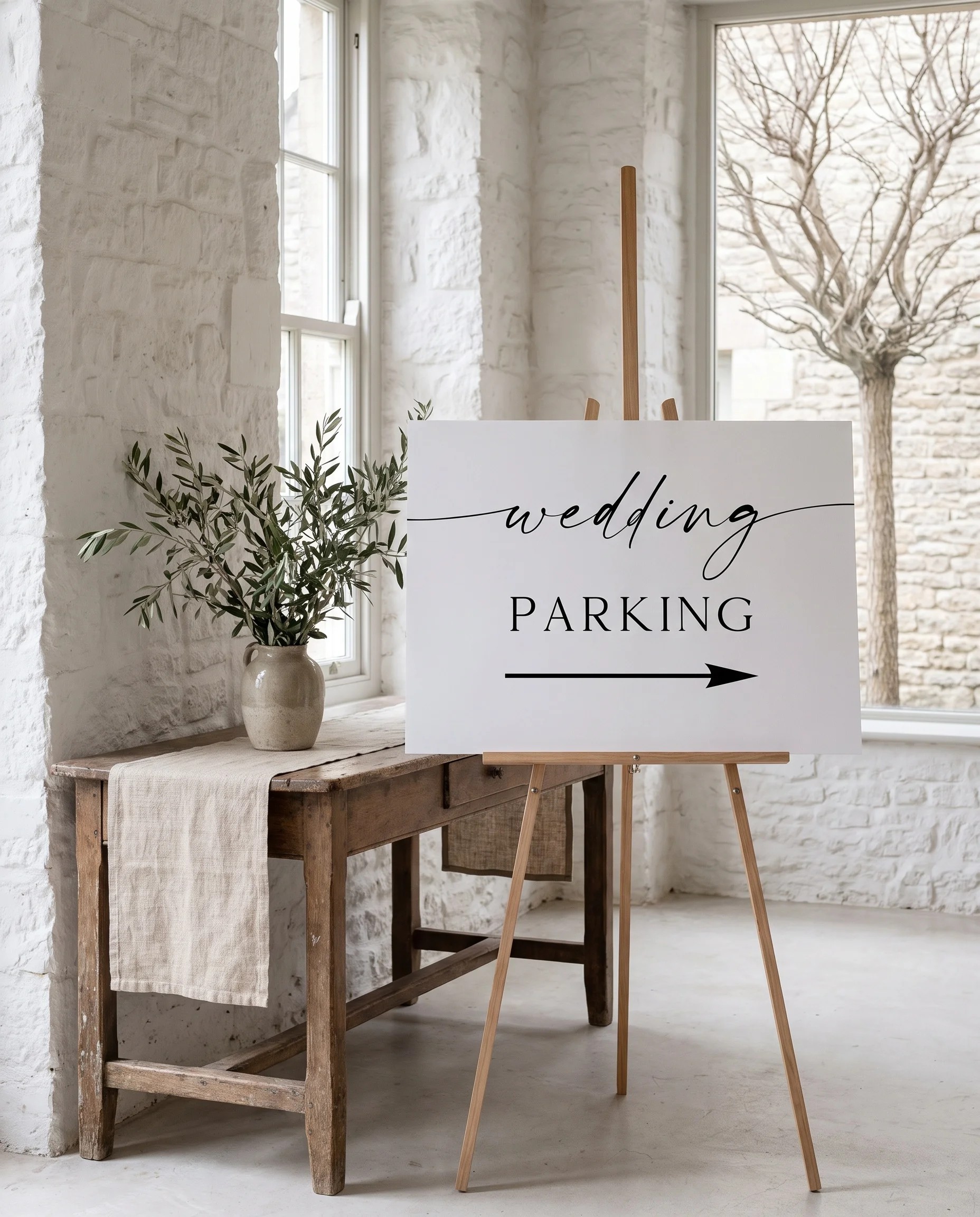 Liminal wedding parking sign — shown beside furniture for scale, captured at a slight overhead angle in soft natural light, wedding signage.