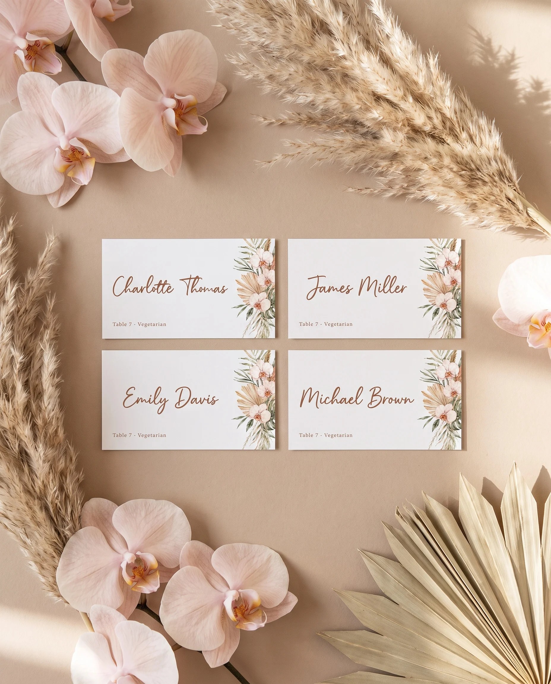 Palm Orchid wedding place cards — several cards shown flat under soft natural light on premium editorial paper, wedding place cards.