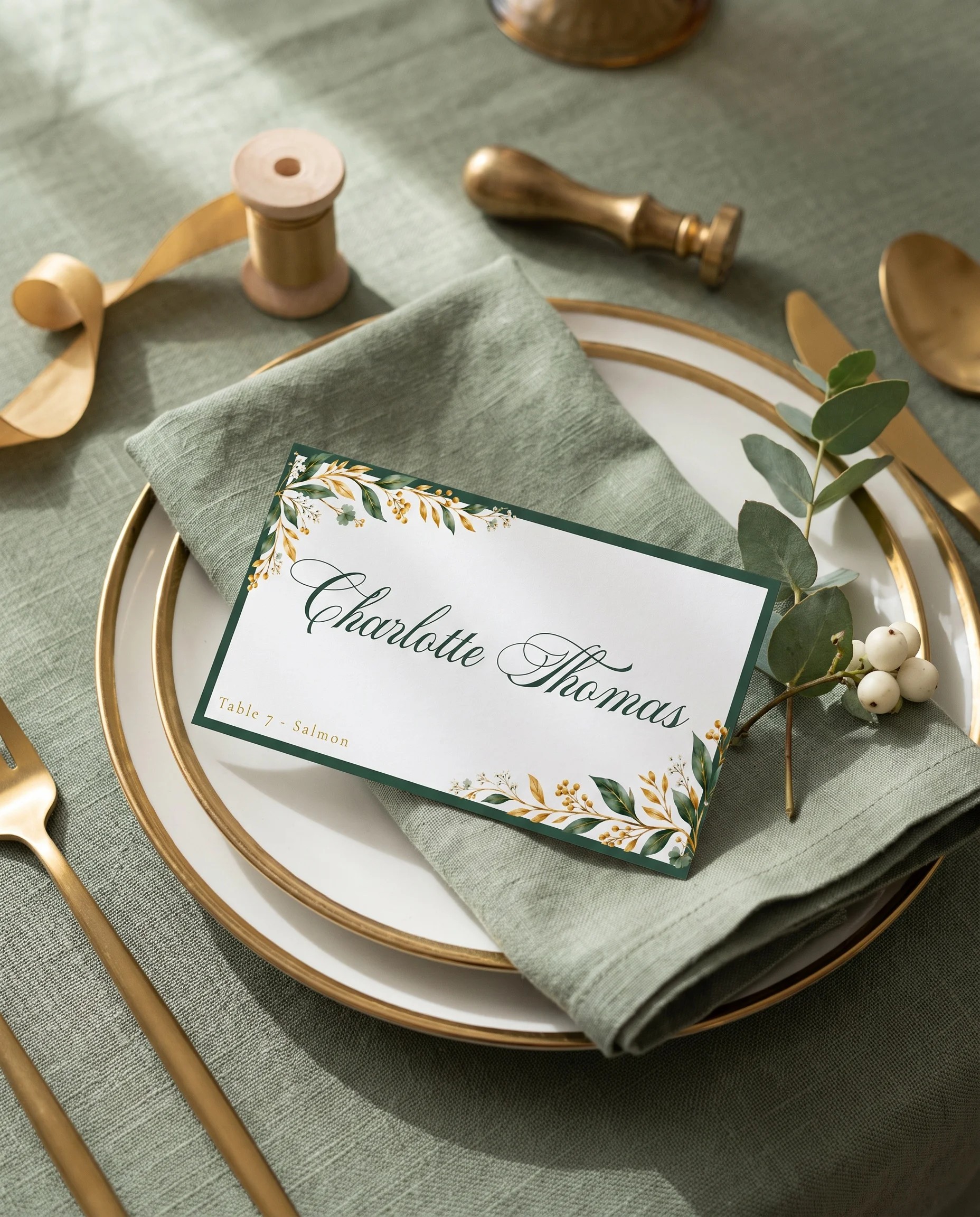 Gilded Foliage wedding place cards — a single card displayed at a set place setting under soft natural light, wedding name cards