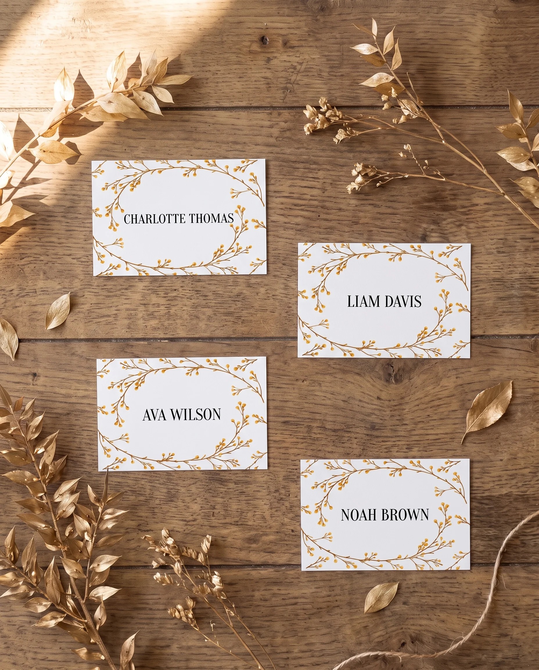 Golden Vine wedding place cards — several cards shown flat in an overhead view under soft natural light, wedding place cards.
