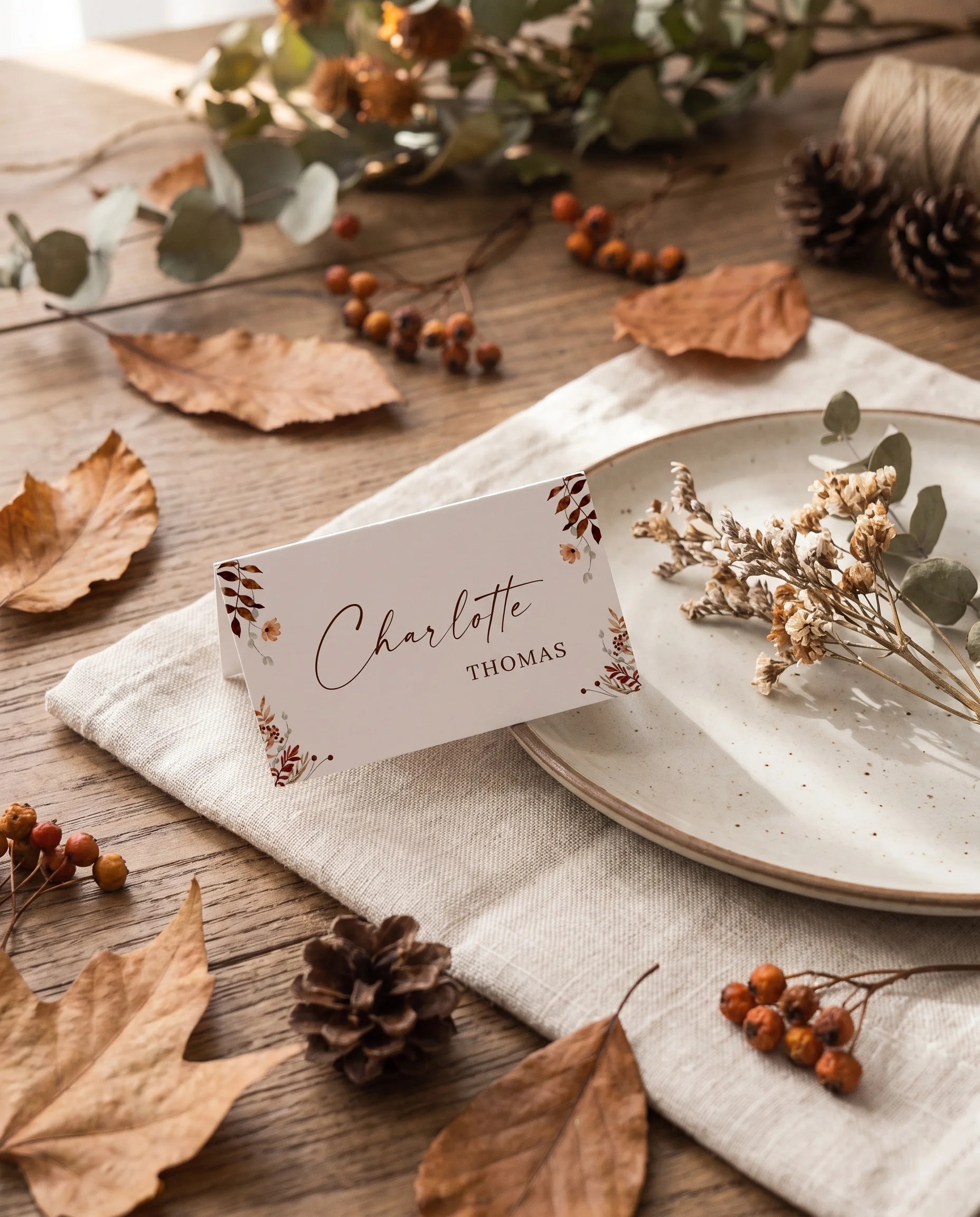 Autumn Bower wedding place cards — a single card displayed at a table place setting under soft natural light, wedding name cards.